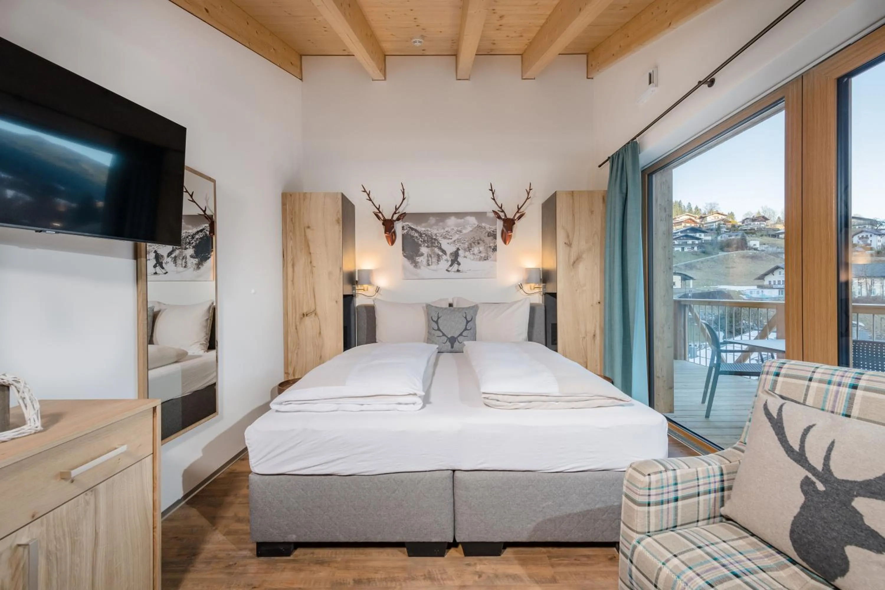 Bedroom, Bed in AlpenParks Hotel & Apartment Hochkönig