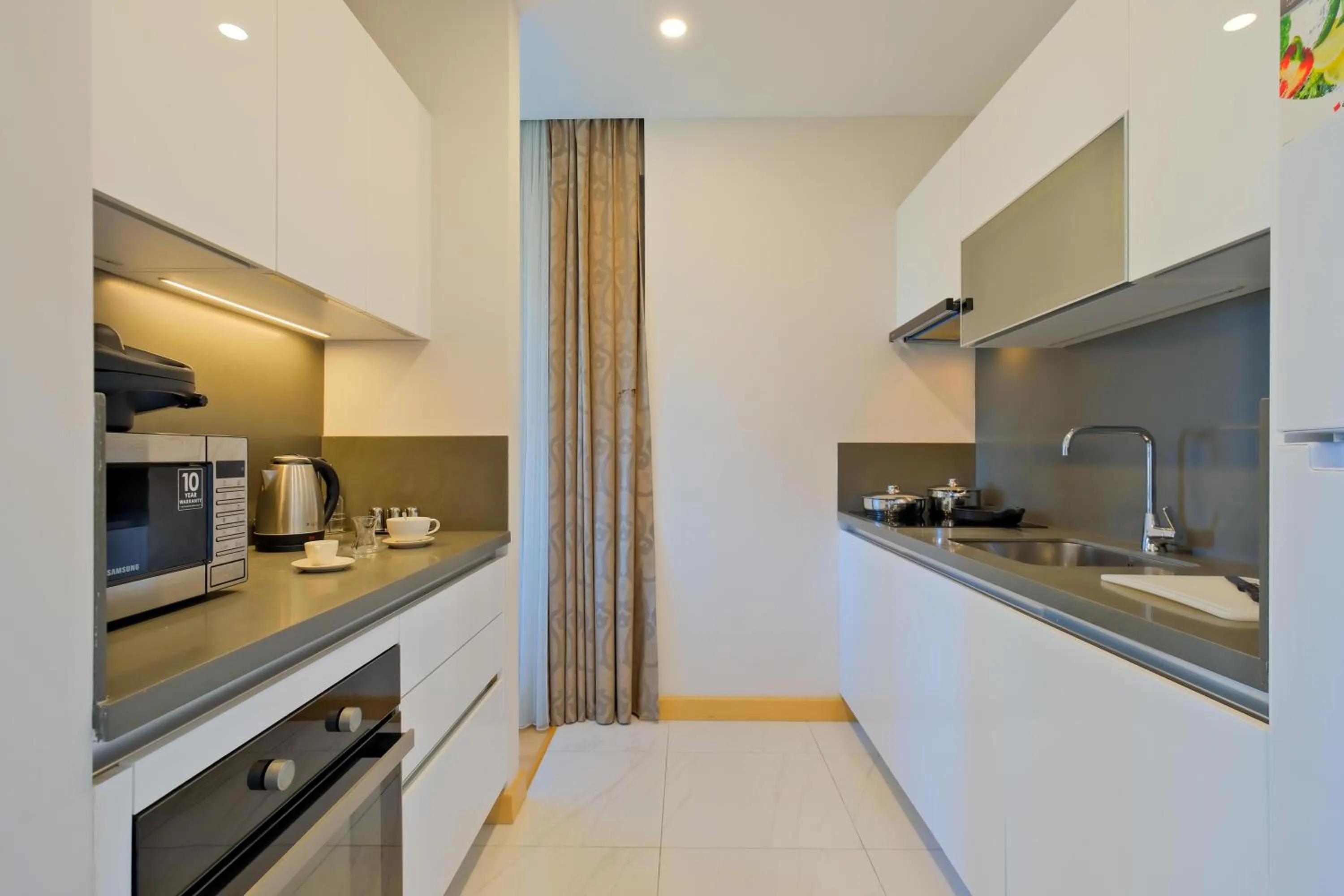 Coffee/tea facilities in Grand Residence by NewInn