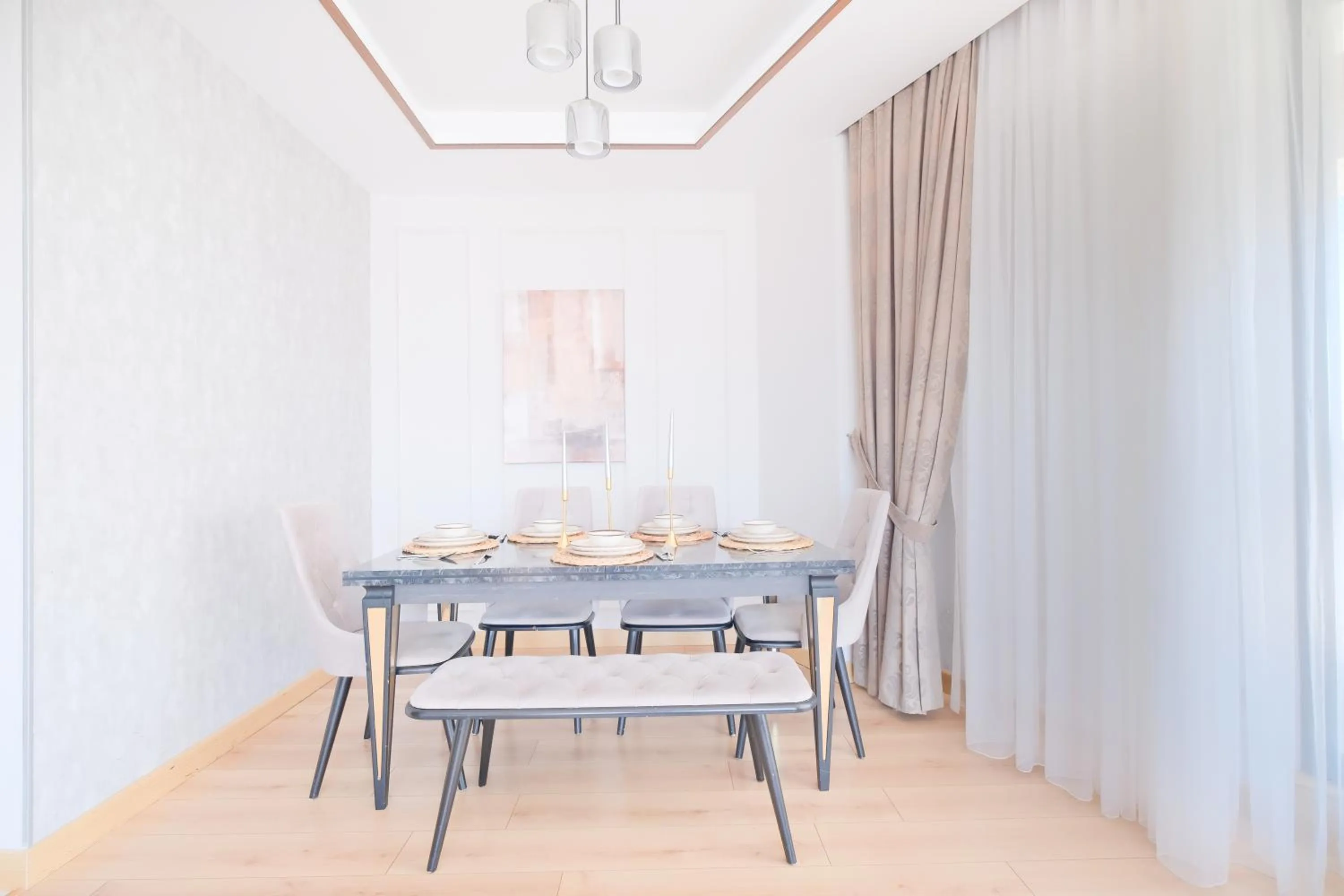 Dining area in Grand Residence by NewInn