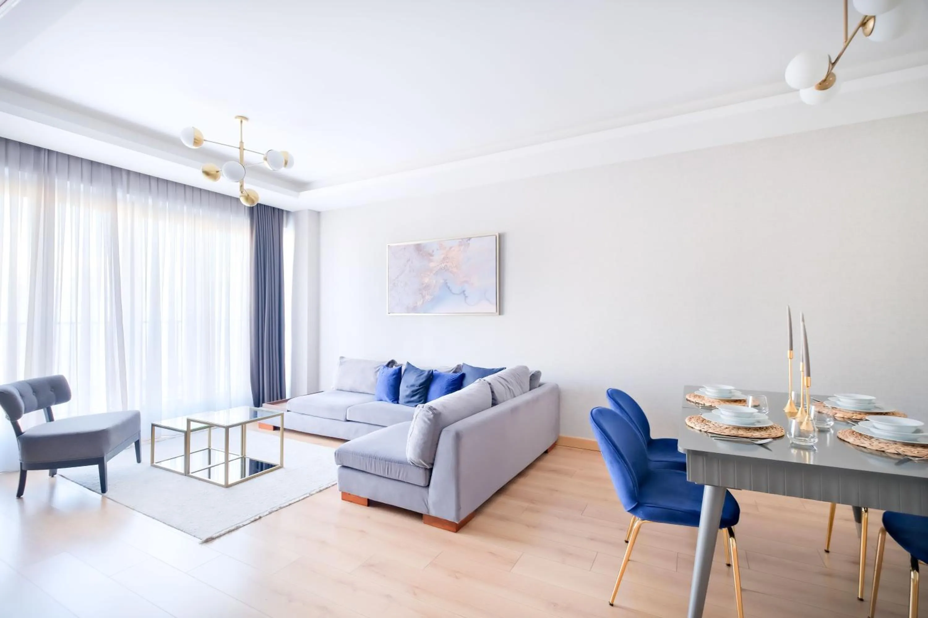 Living room in Grand Residence by NewInn