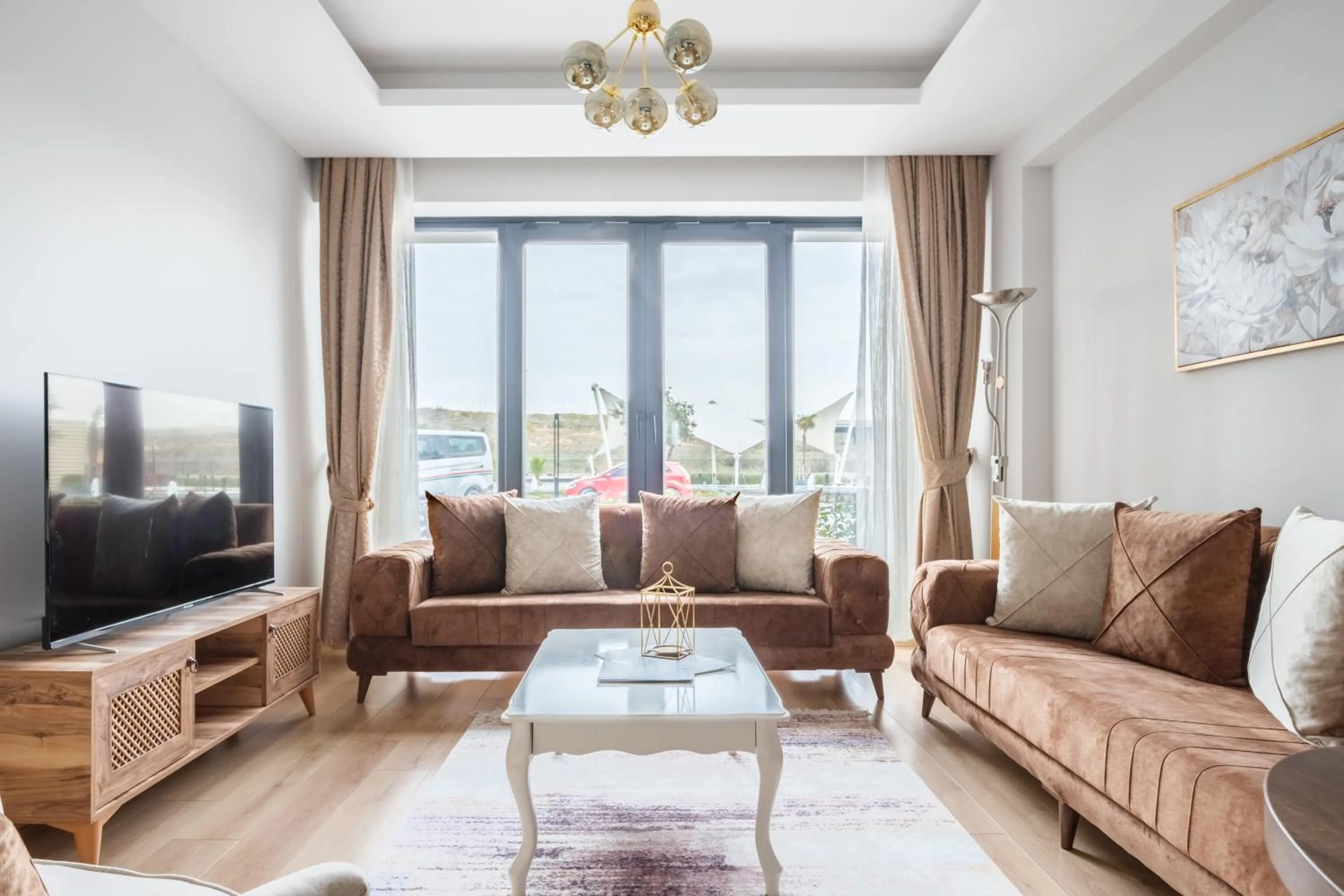 Seating area in Grand Residence by NewInn