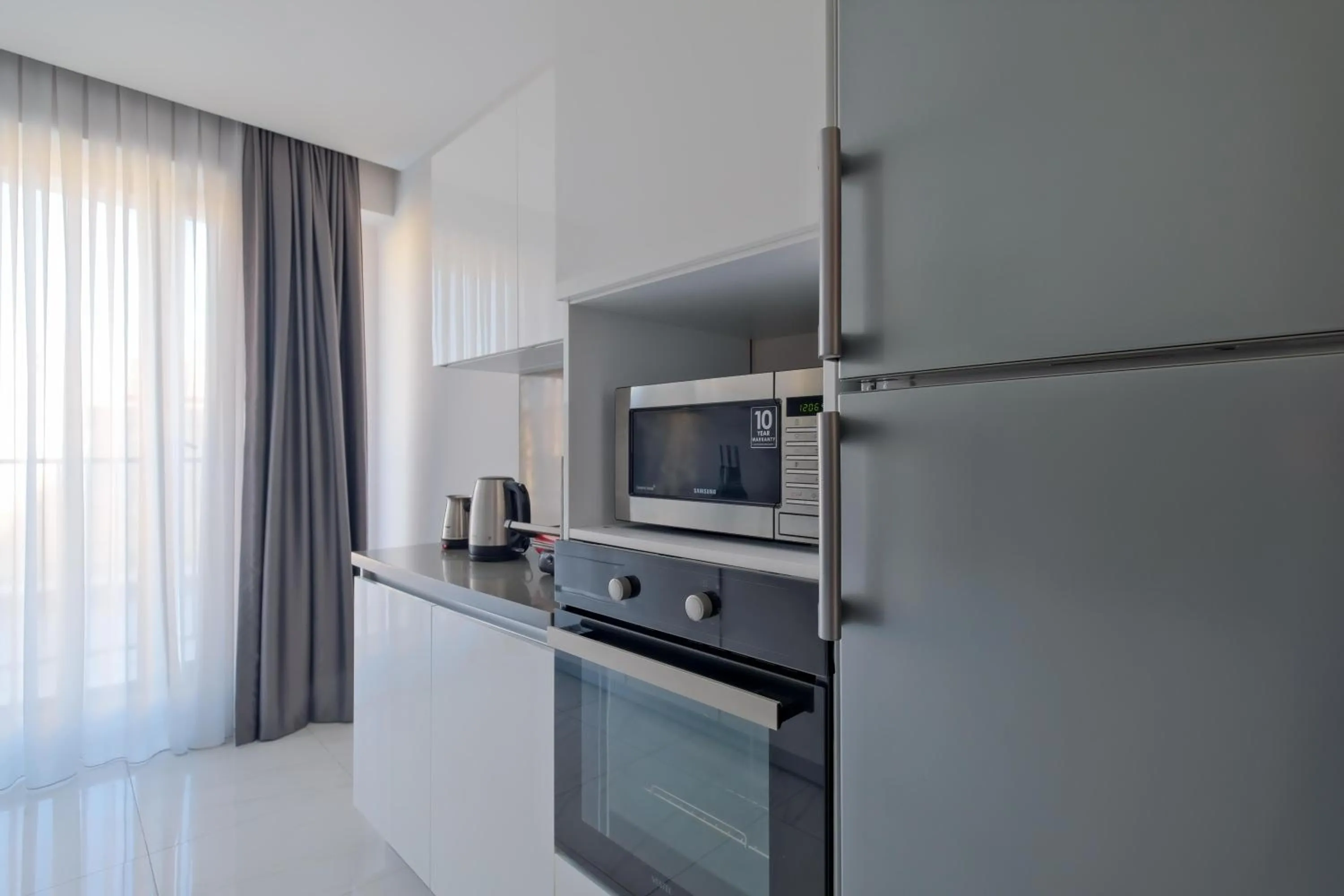 dishwasher in Grand Residence by NewInn