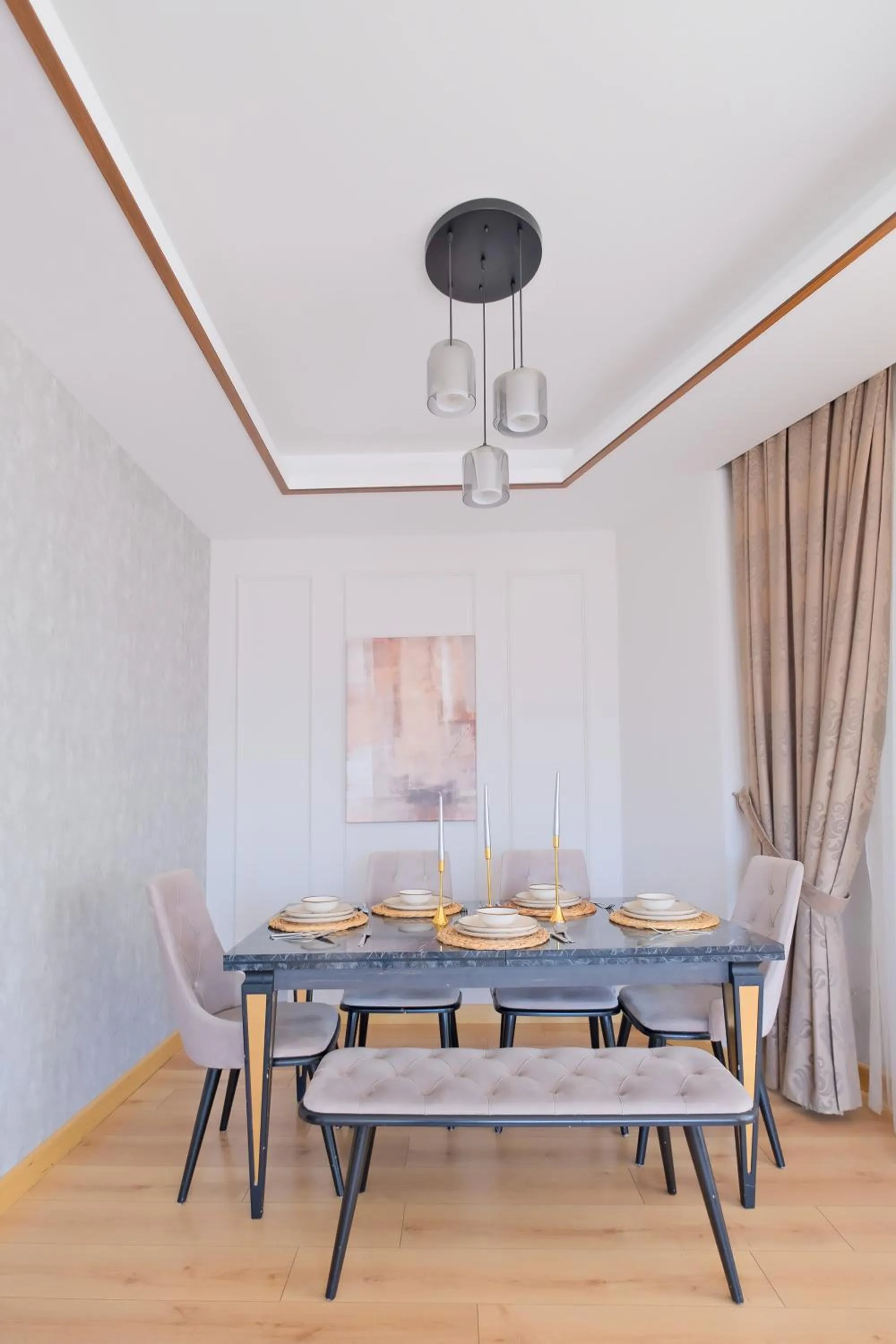 Dining area in Grand Residence by NewInn