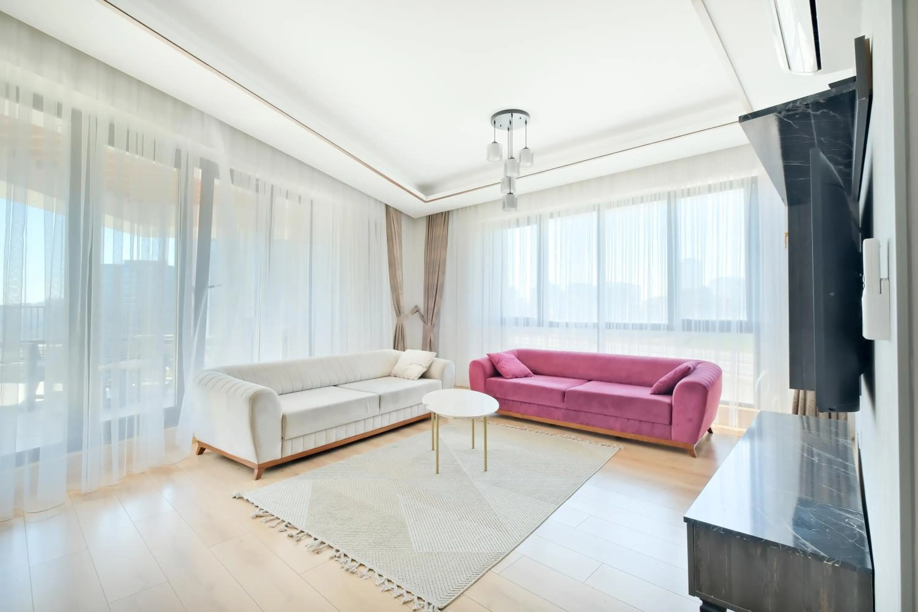 TV and multimedia in Grand Residence by NewInn