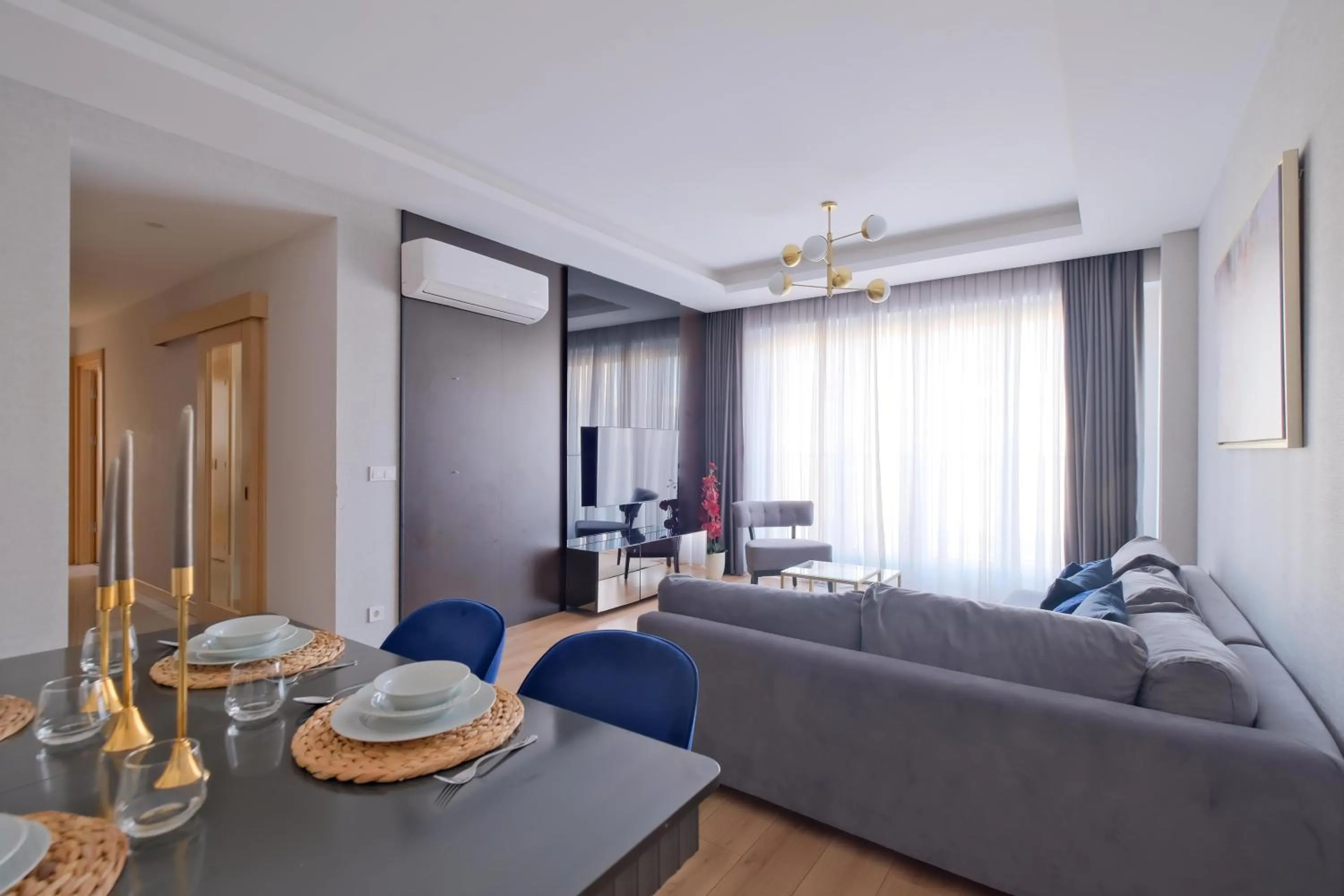 Living room in Grand Residence by NewInn