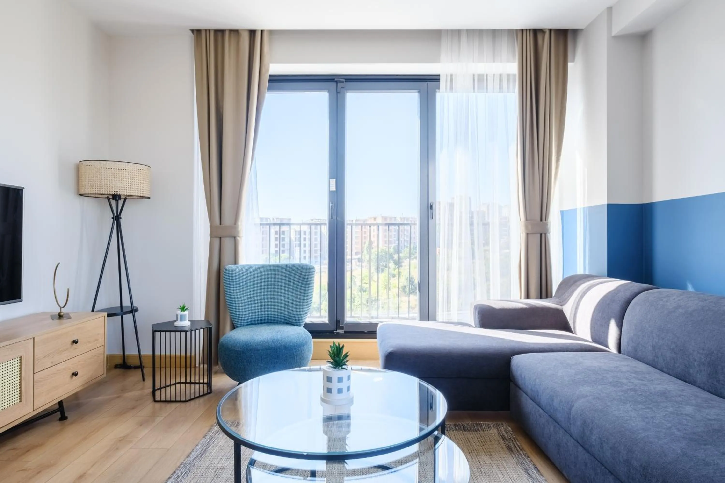 Living room in Grand Residence by NewInn