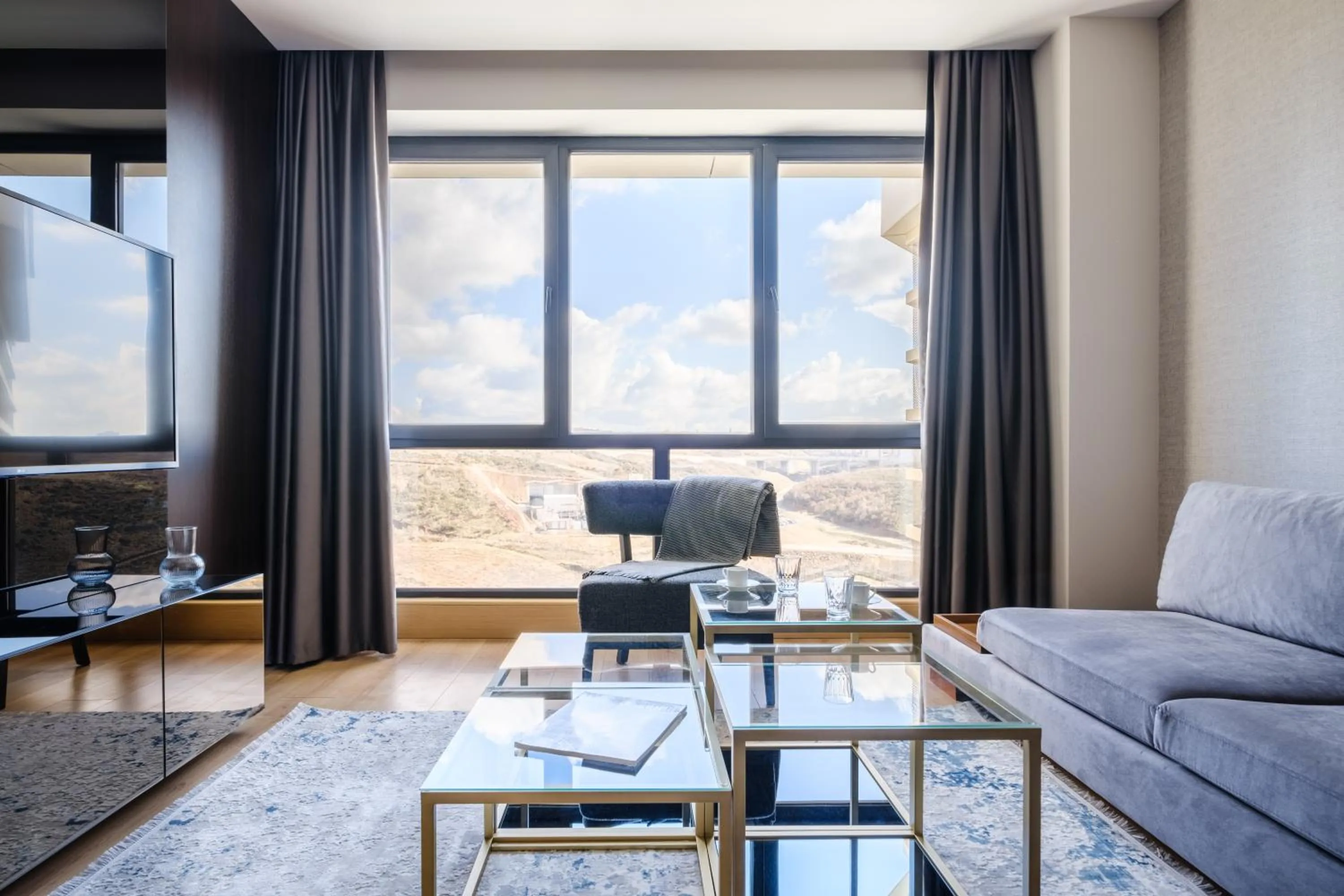 Living room in Grand Residence by NewInn