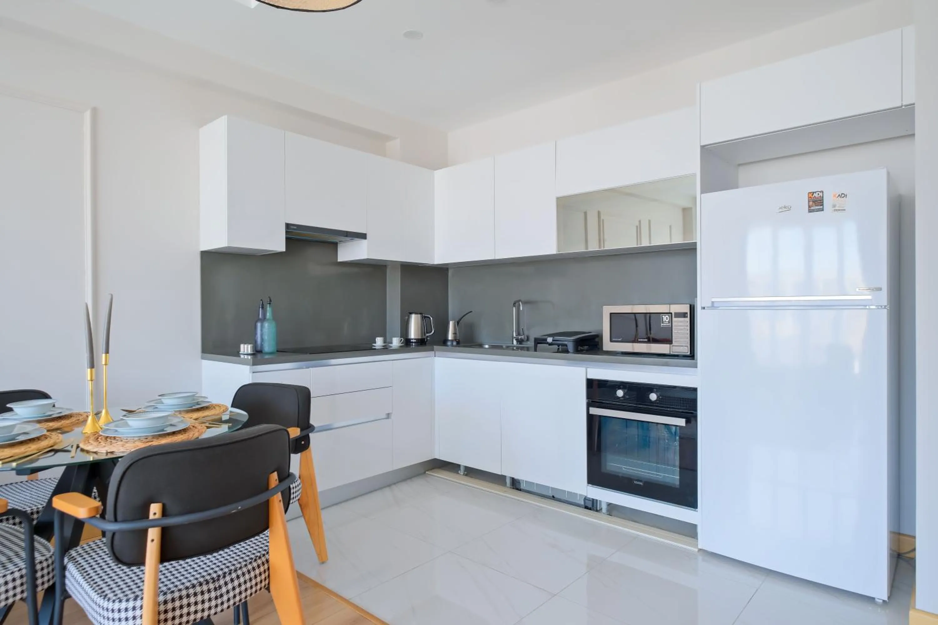 Dining area in Grand Residence by NewInn