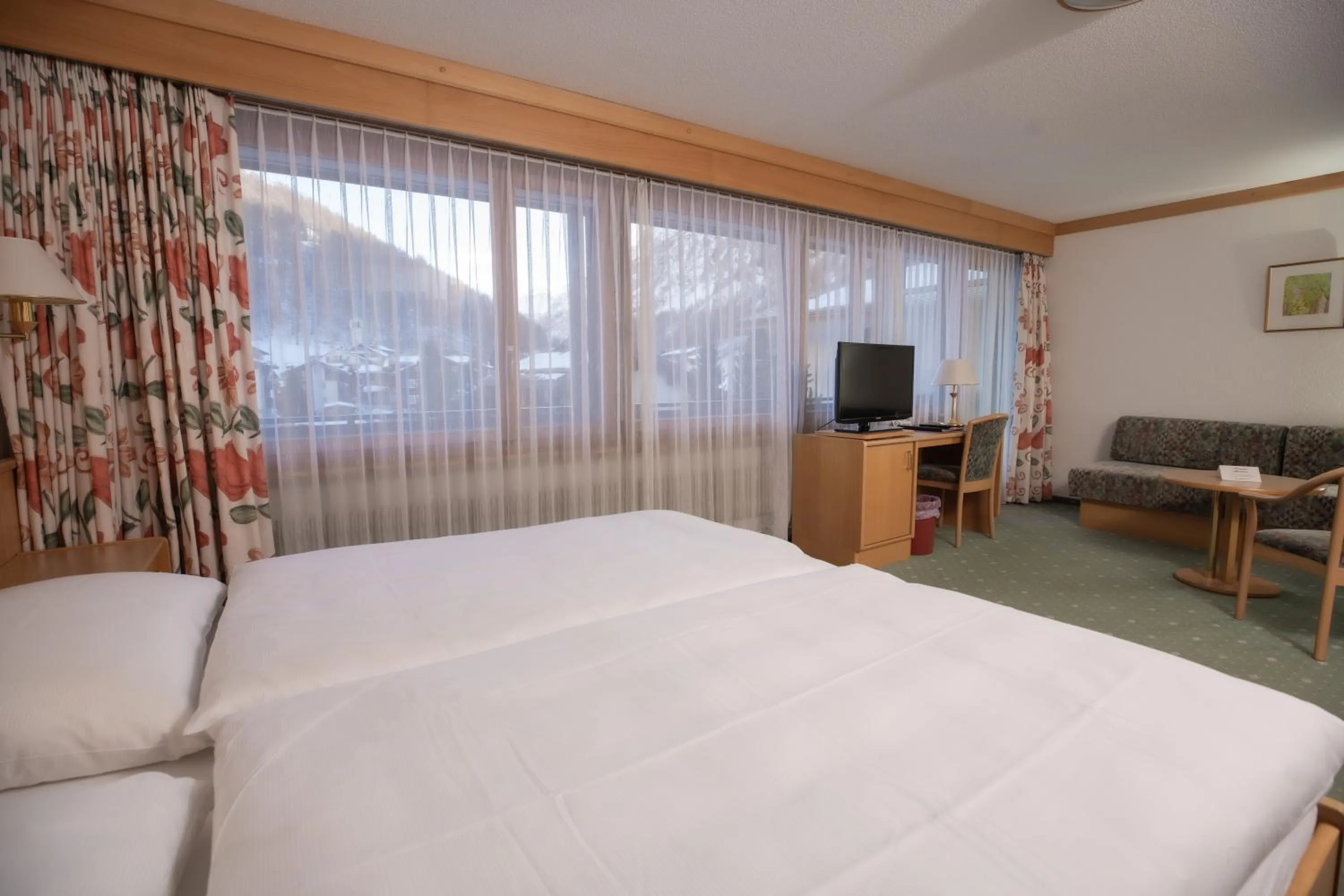 Bed in Hotel Alpenhof