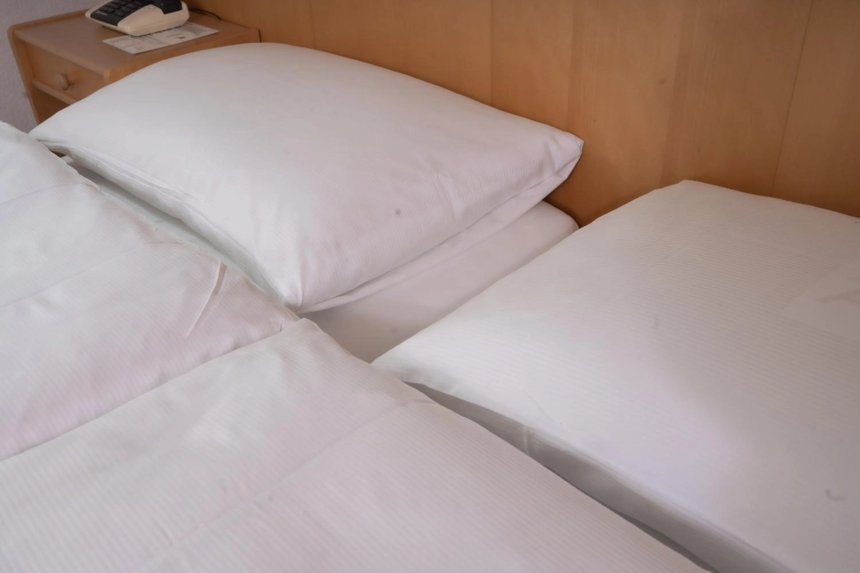 Bed in Hotel Alpenhof