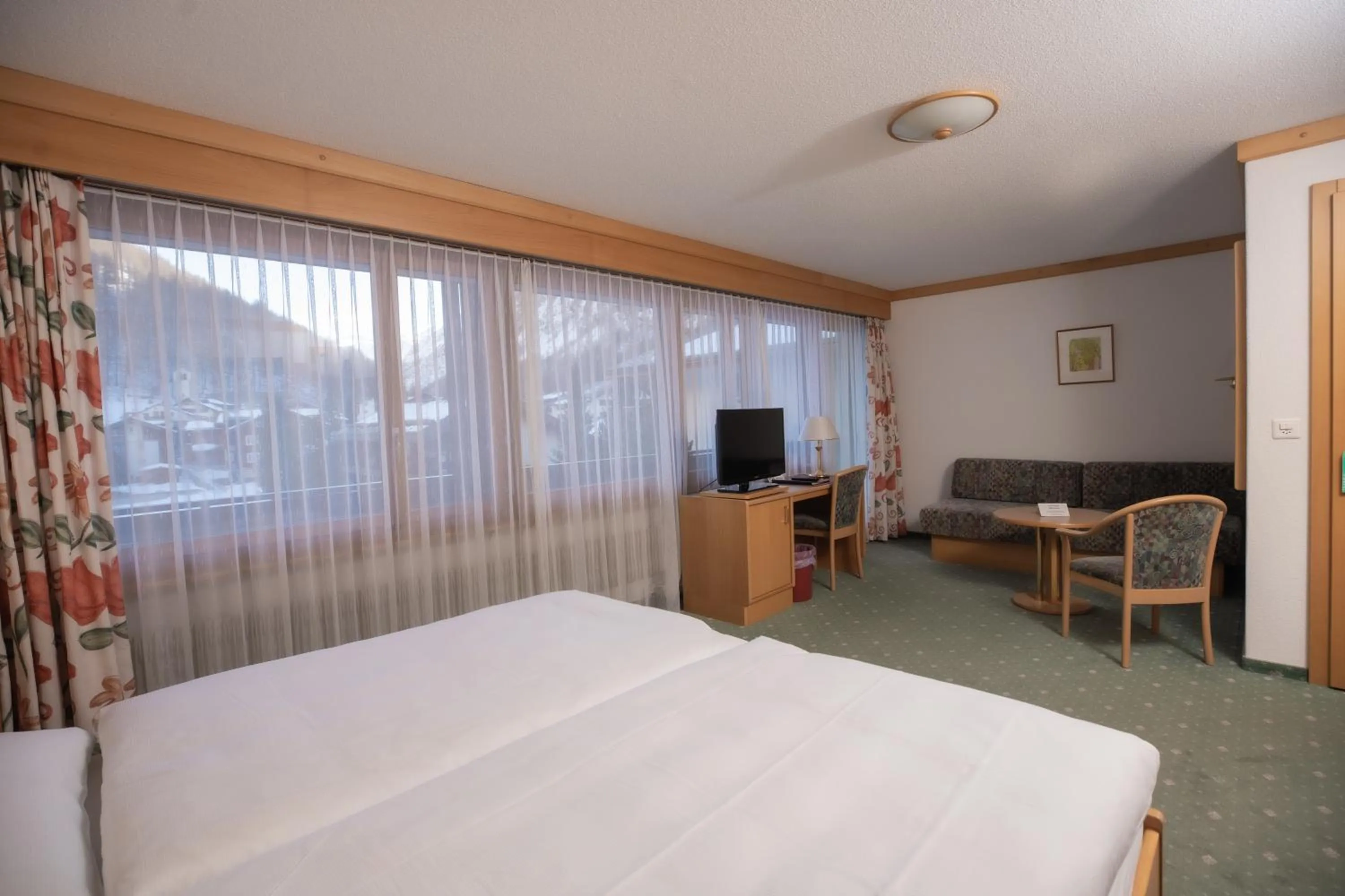 Bed in Hotel Alpenhof