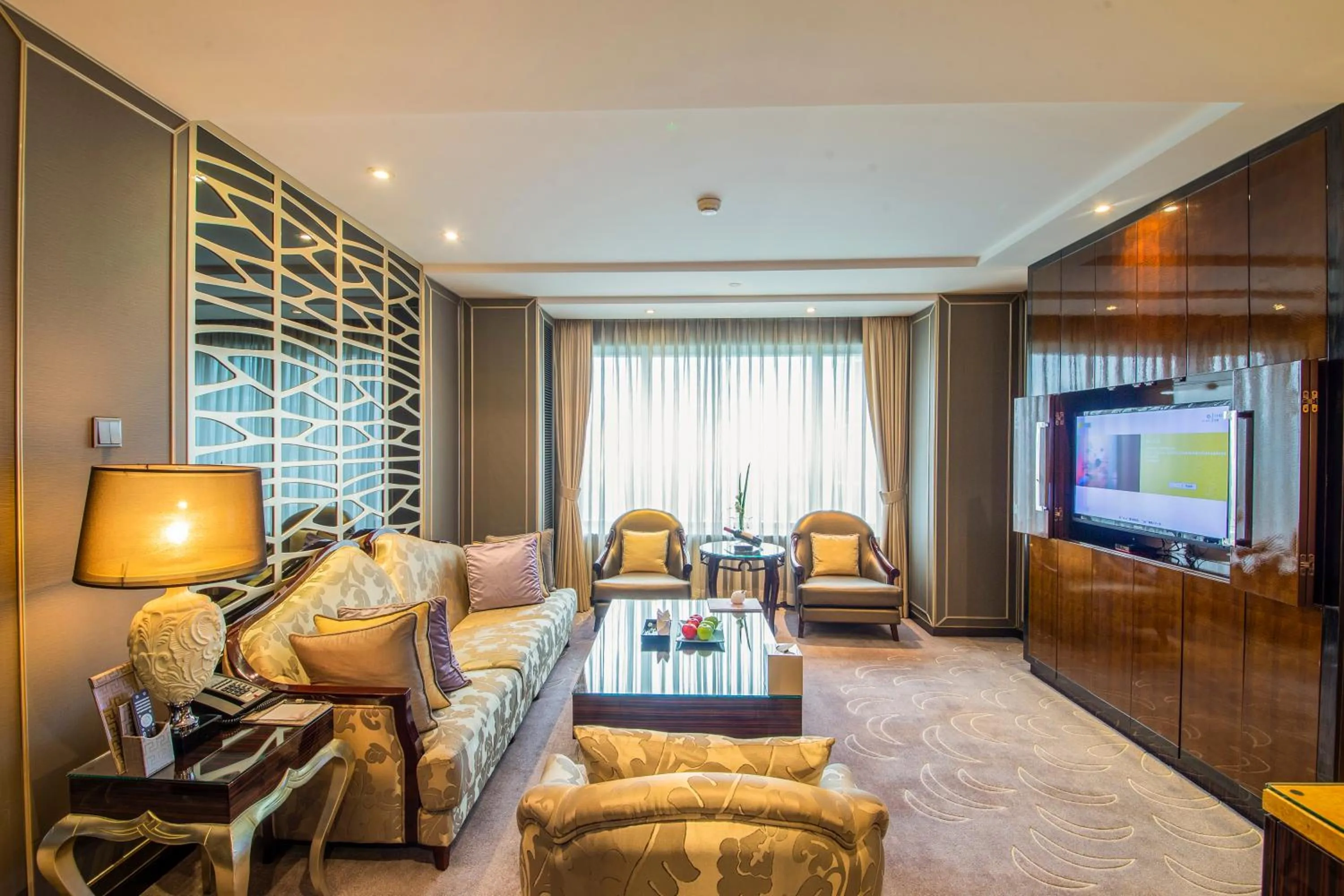 Living room in The Kunlun Beijing Jin Jiang Radisson