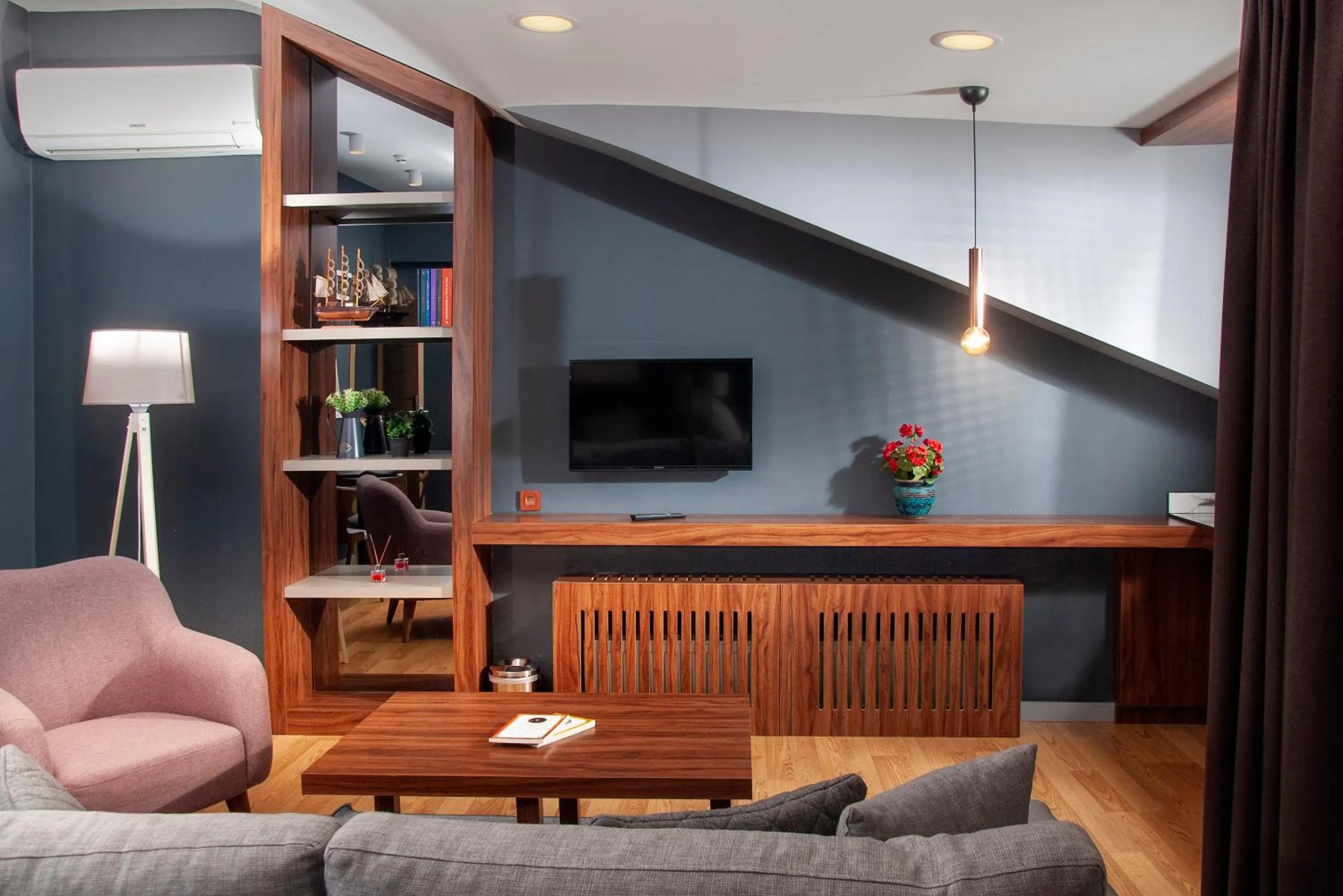 Communal lounge/ TV room in Vitabella Suites