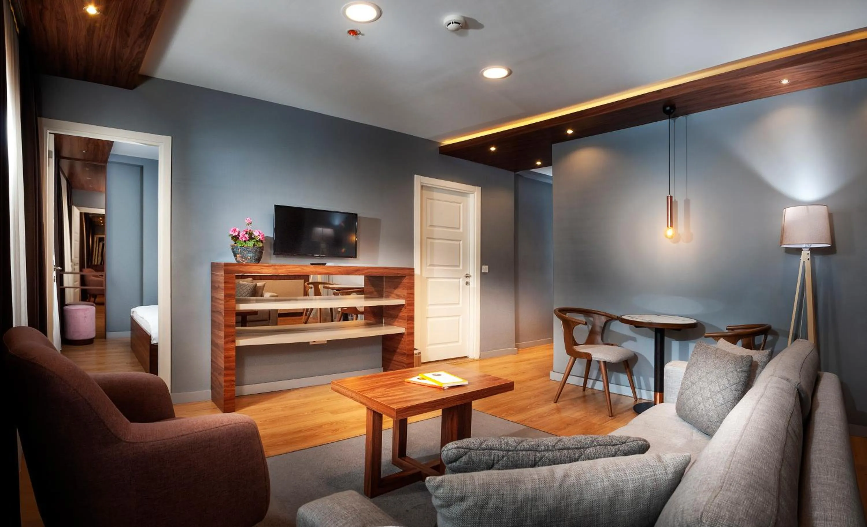 Communal lounge/ TV room in Vitabella Suites