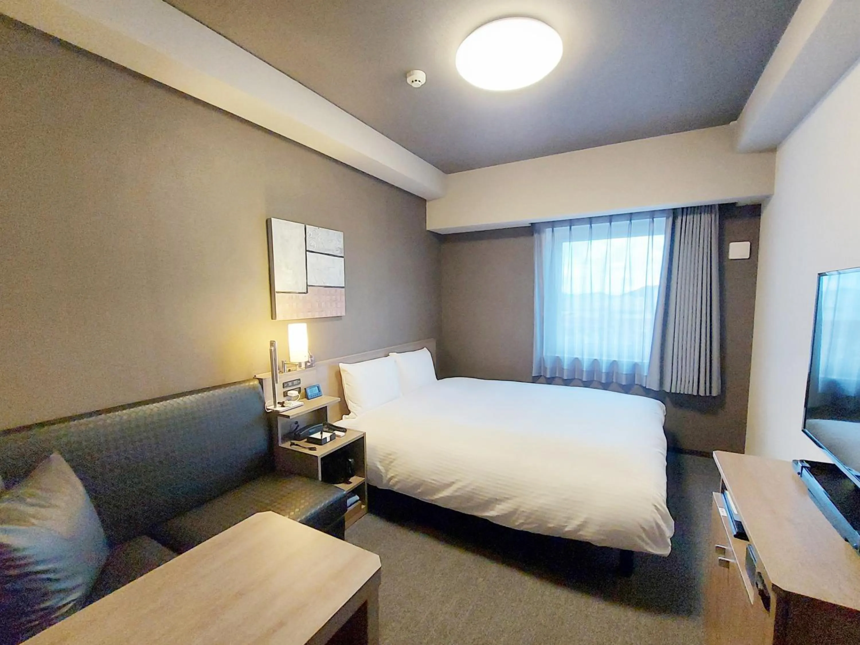 Photo of the whole room, Bed in Hotel Route Inn Kusatsu Ritto -Ritto Inter Kokudo 1 gou-