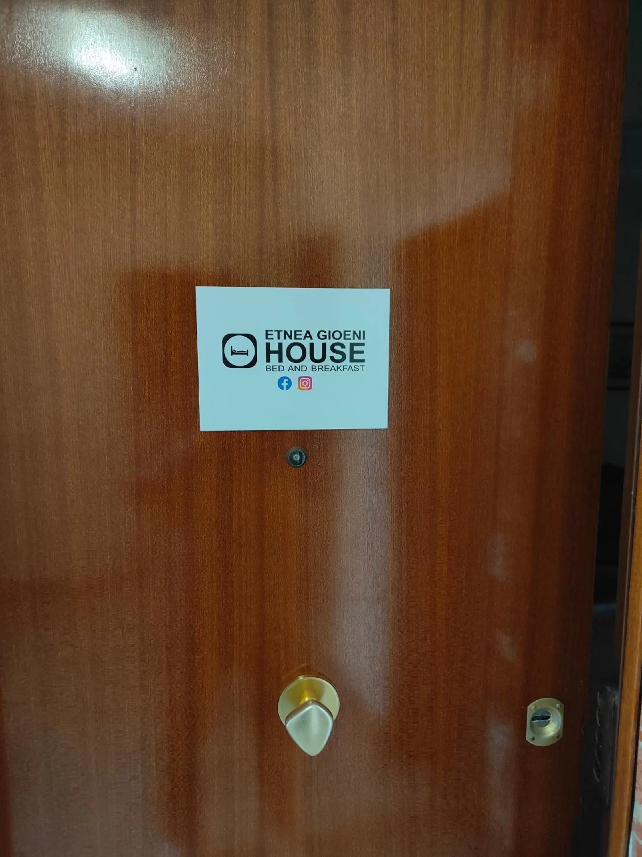 Property logo or sign in Etnea Gioeni House Suite