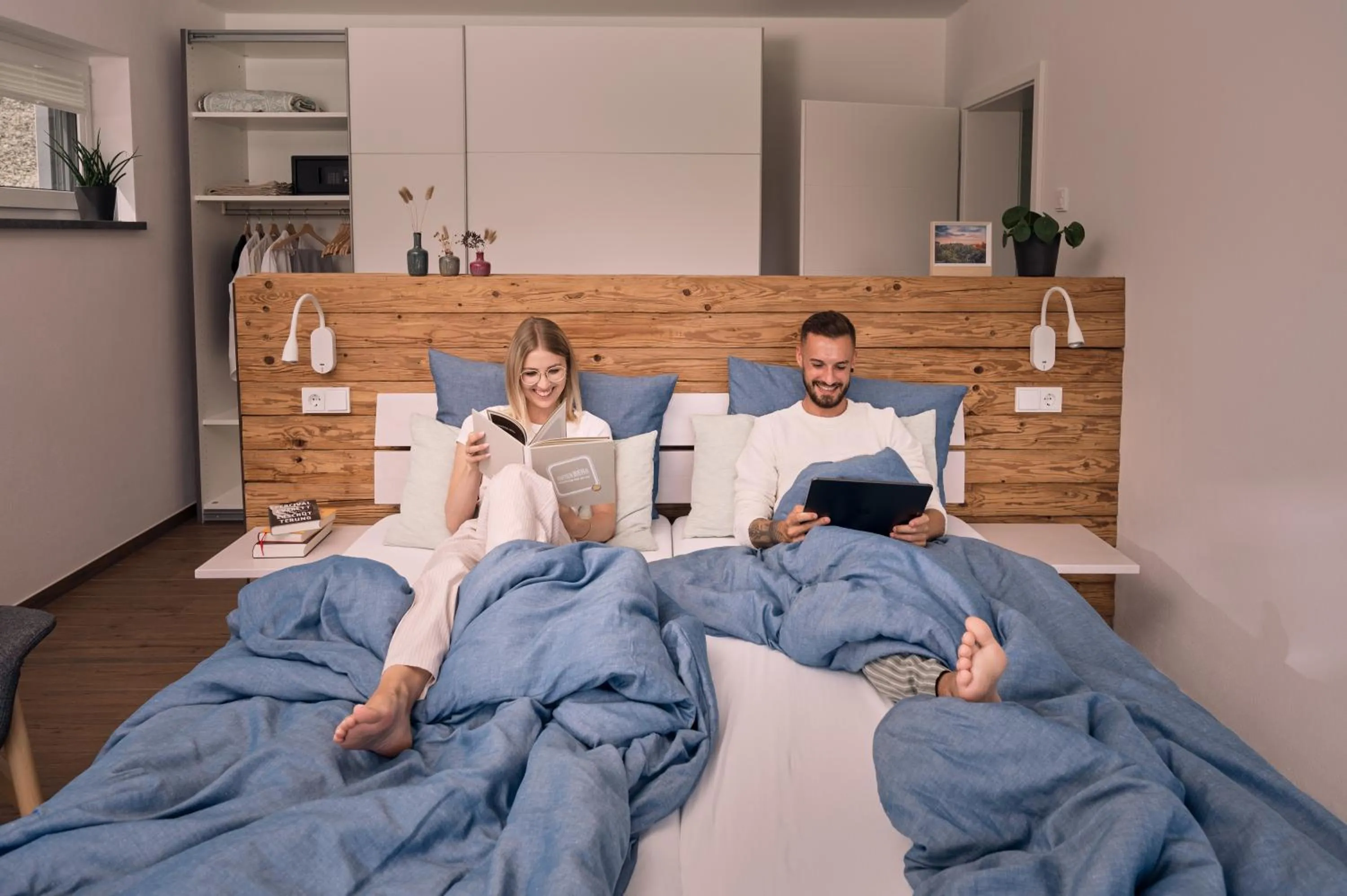 Bed in BLEIBE VIER Ferienwohnungen