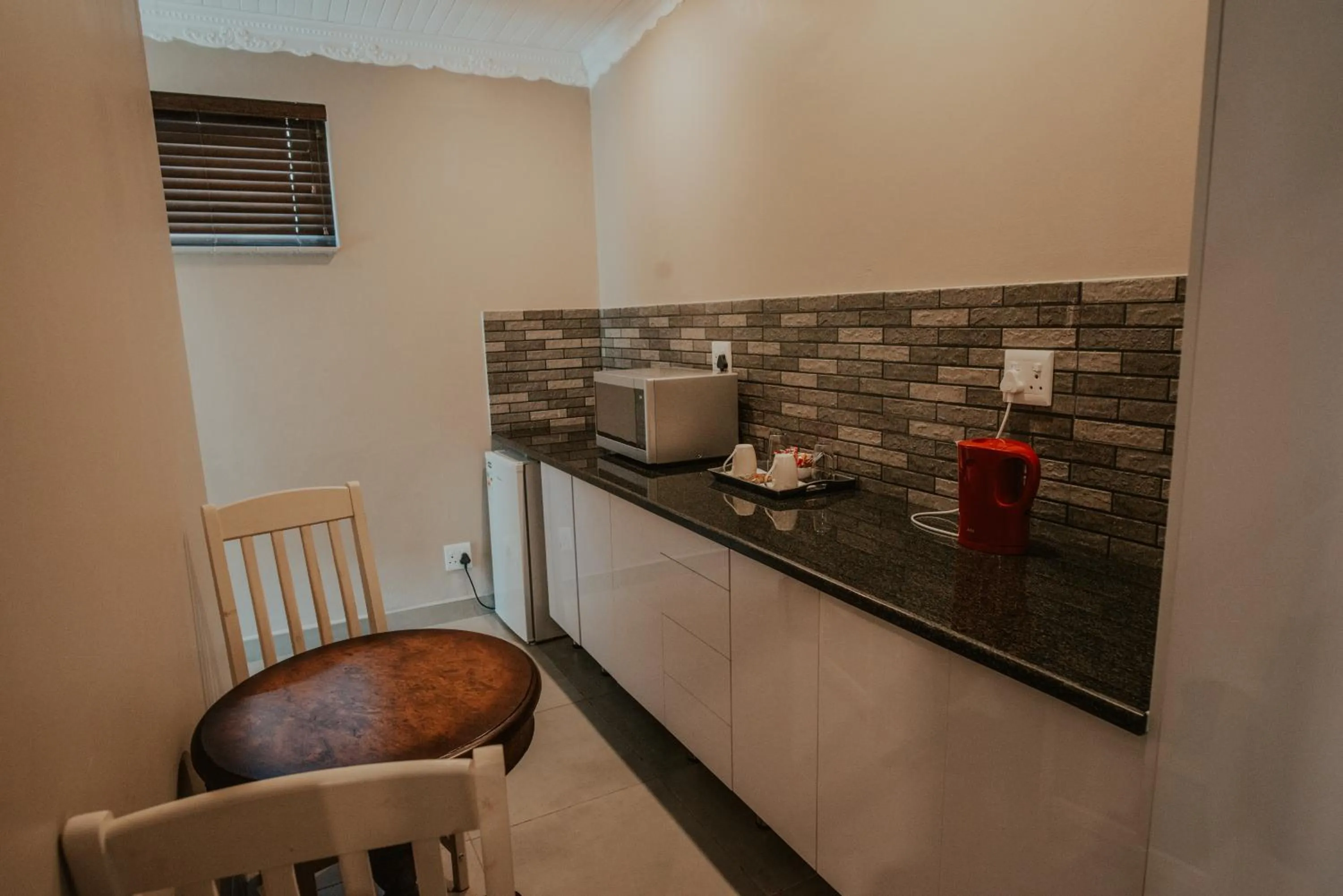 Kitchen or kitchenette in Le Grant Guesthhouse