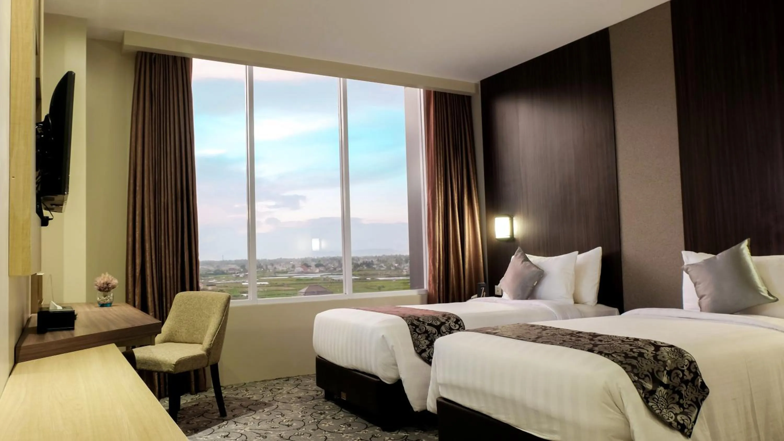 Bed in Aston Gorontalo Hotel & Convention Center