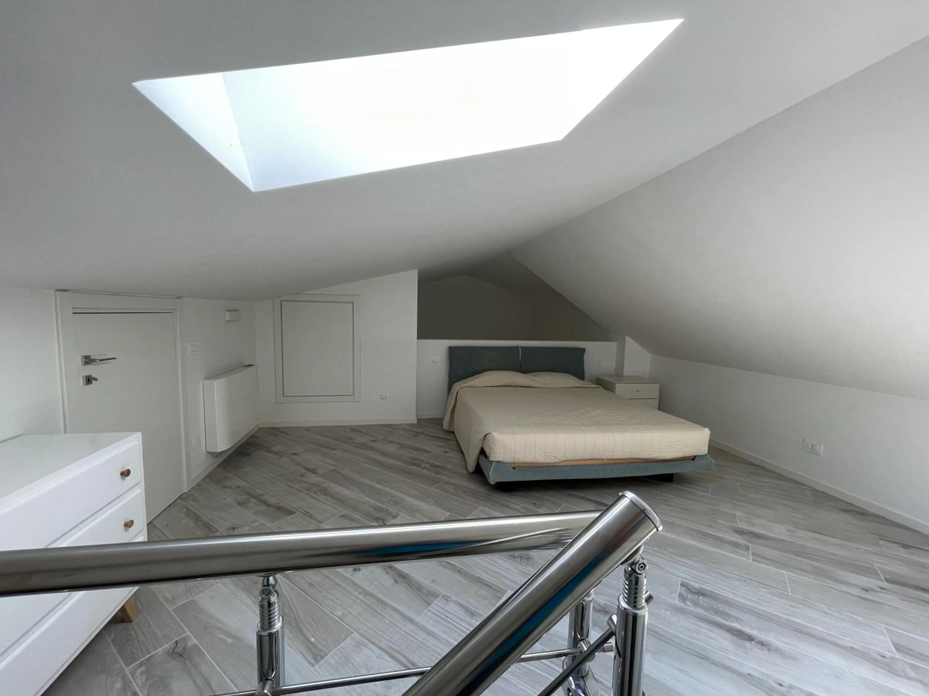 Bed in Gli Scogli Luxury Residence Hotel