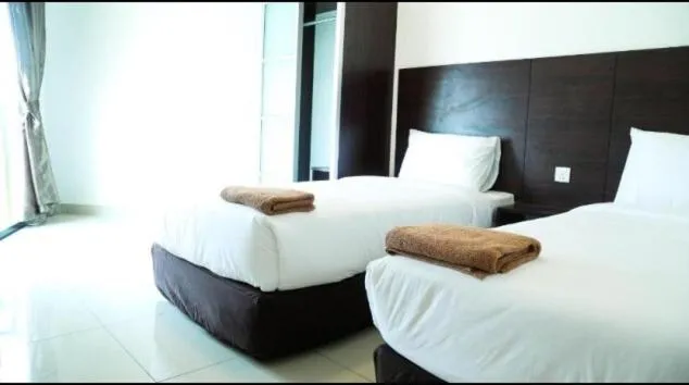 Bed in Marina Height Seaview Resort Apartment