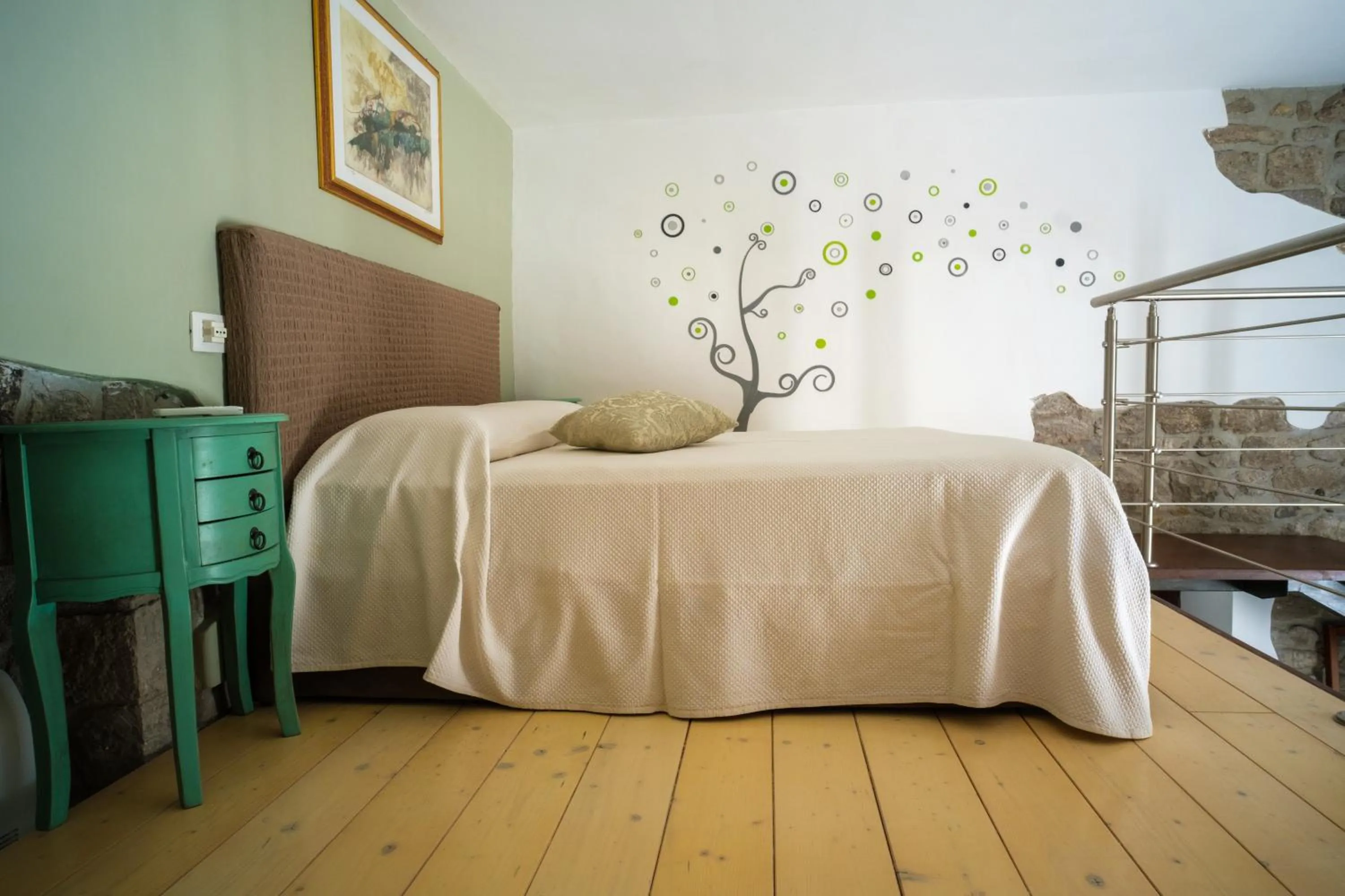 Bed in Locanda Villa Naumanni