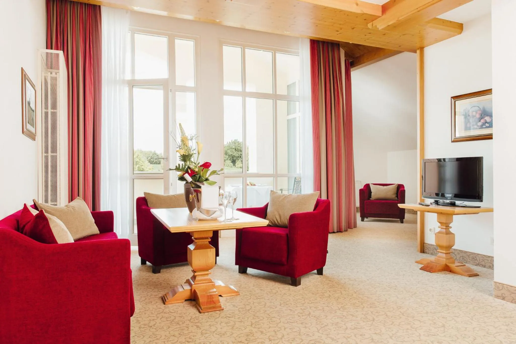 Seating area in MAXIMILIAN Grand Hotel