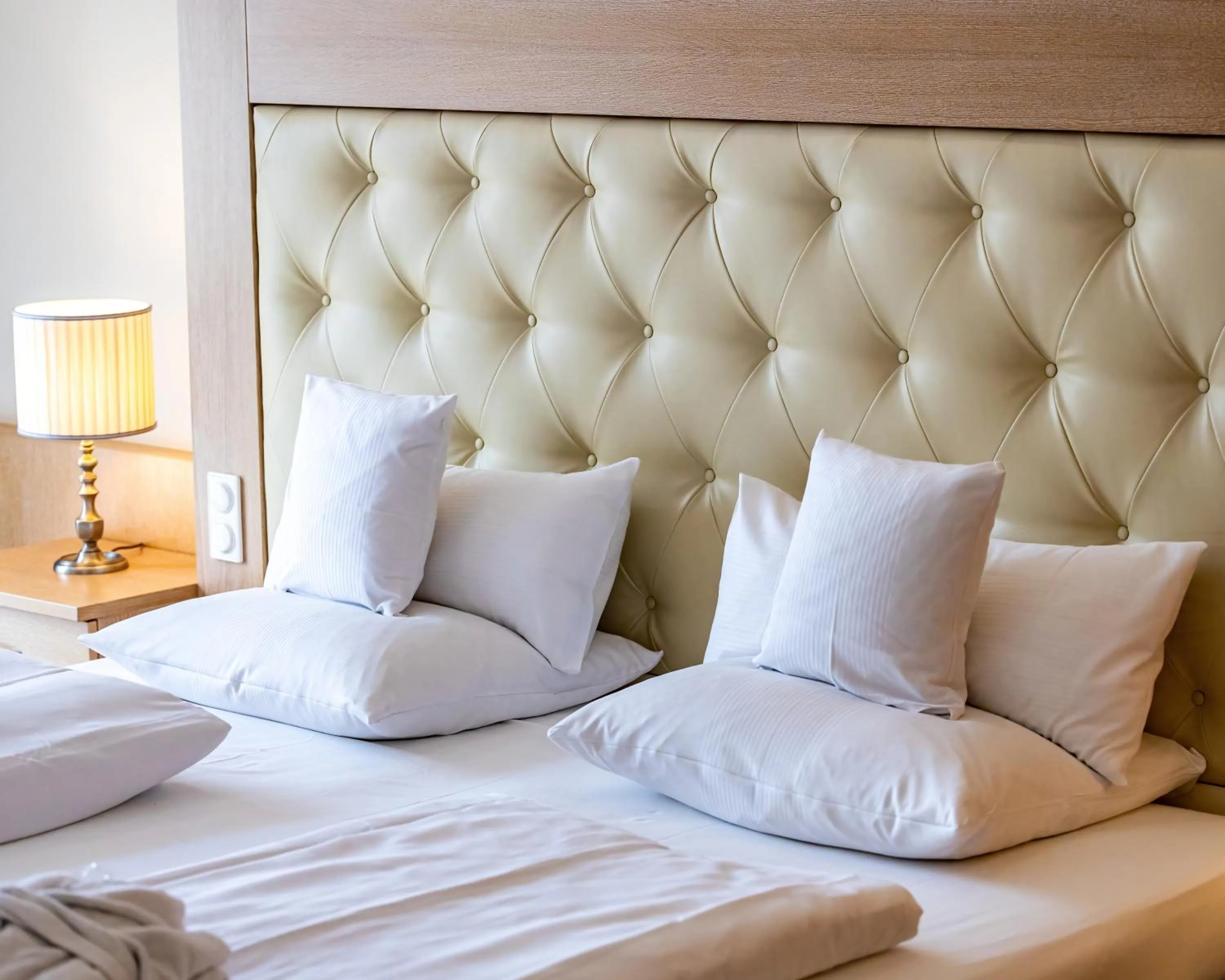 Bed in Hotel Maximilian