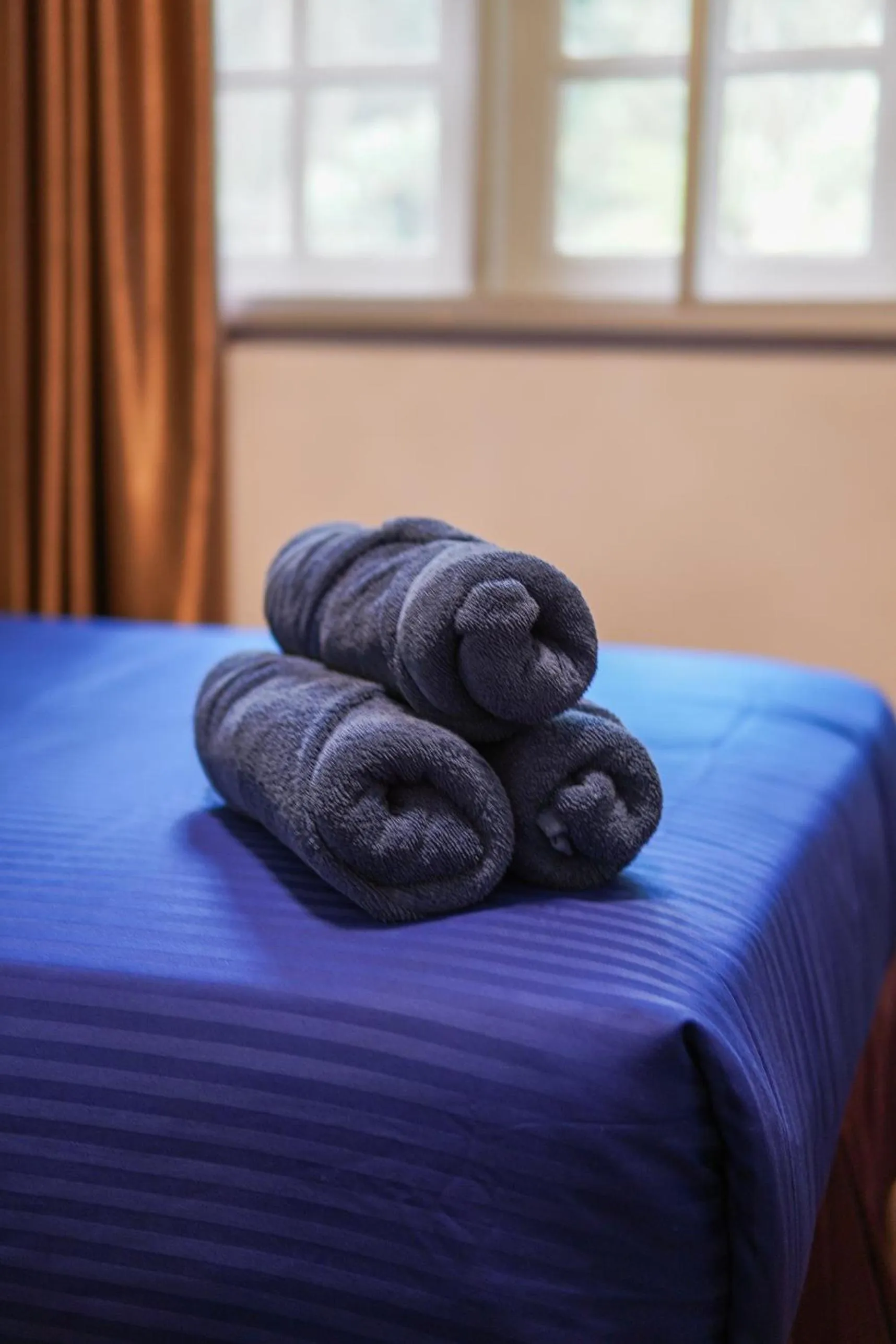 Bed in Parkland Suites