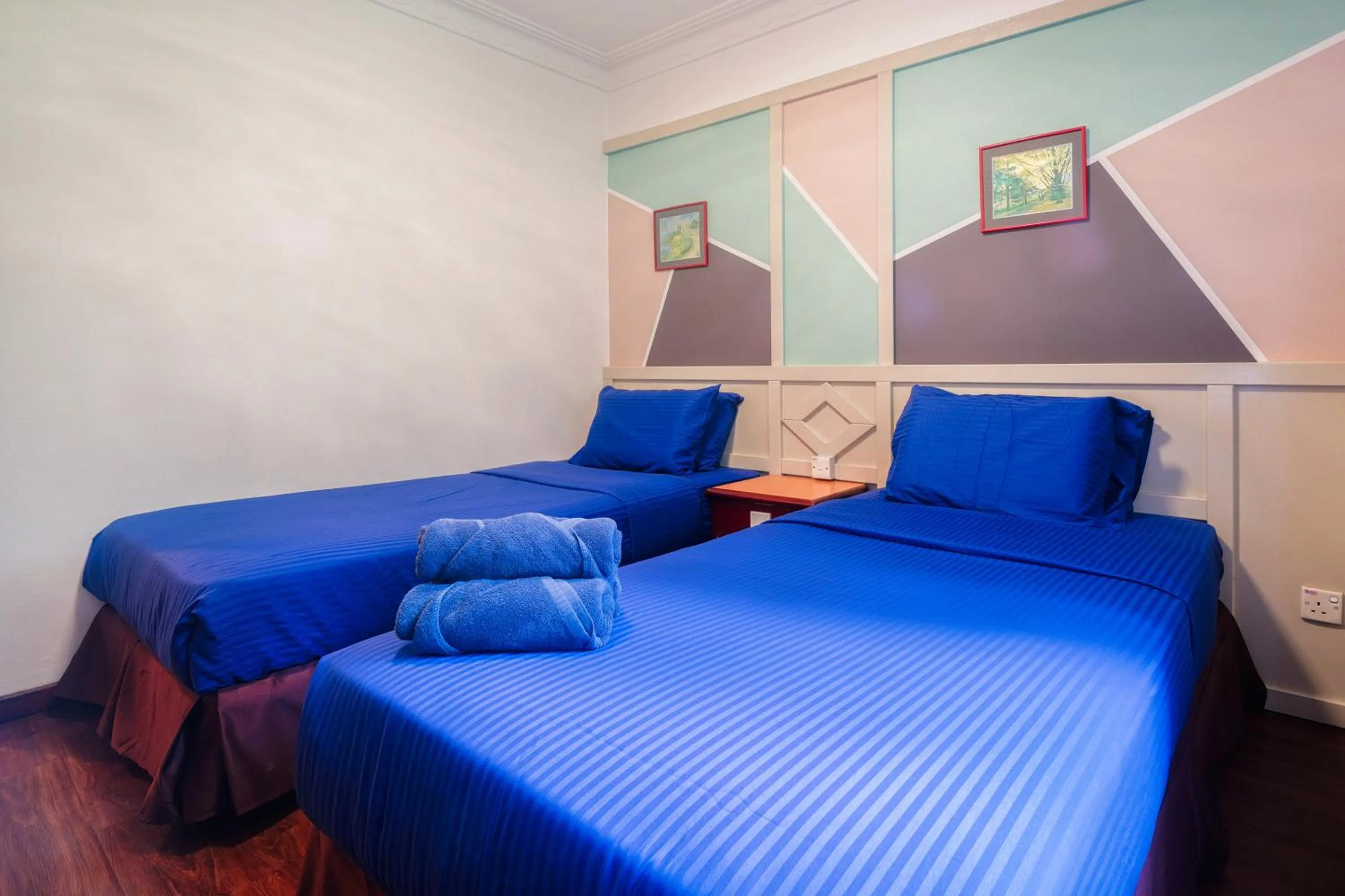 Bed in Parkland Suites