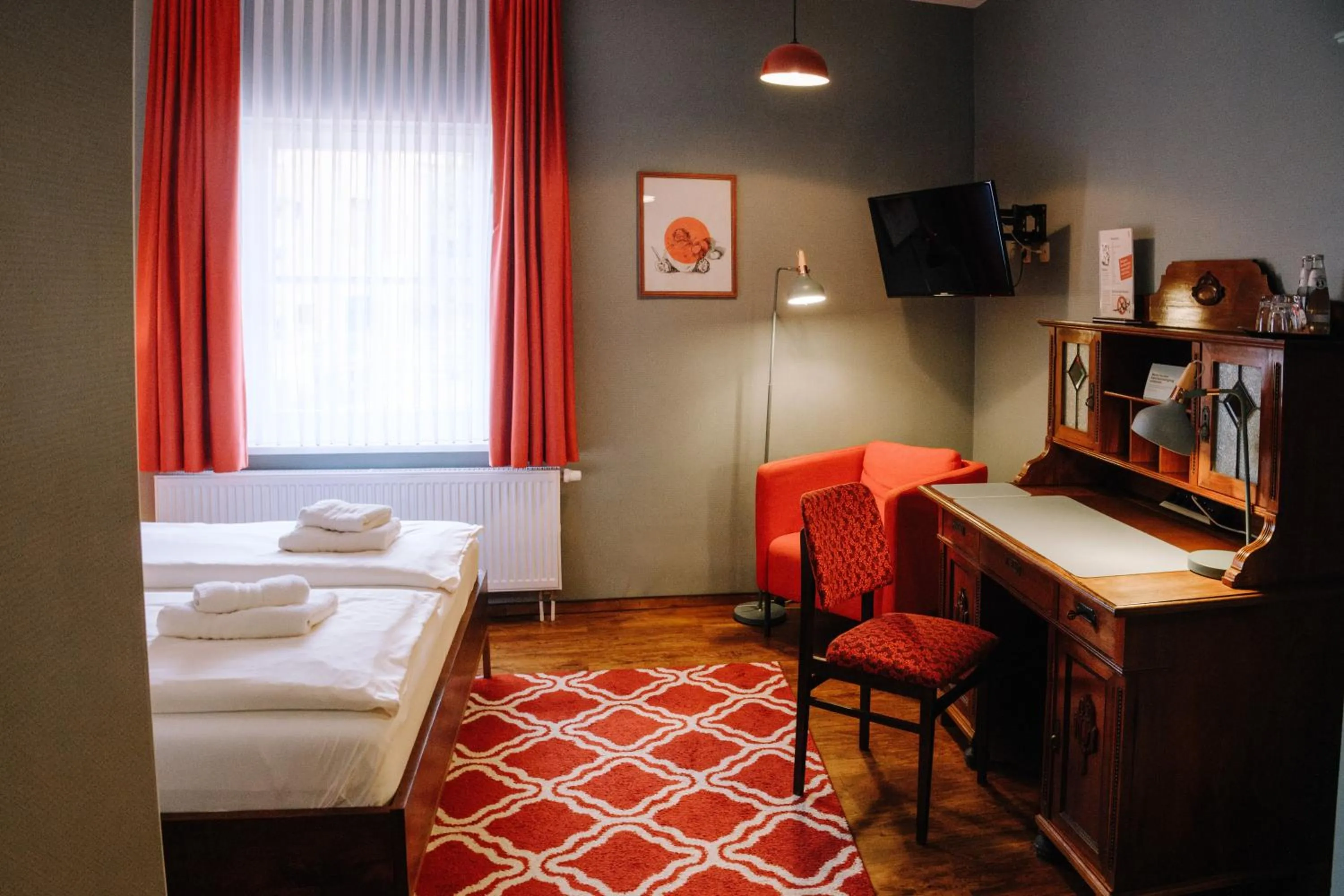 Photo of the whole room, Bed in SCHULZENS Brauerei & Hotel