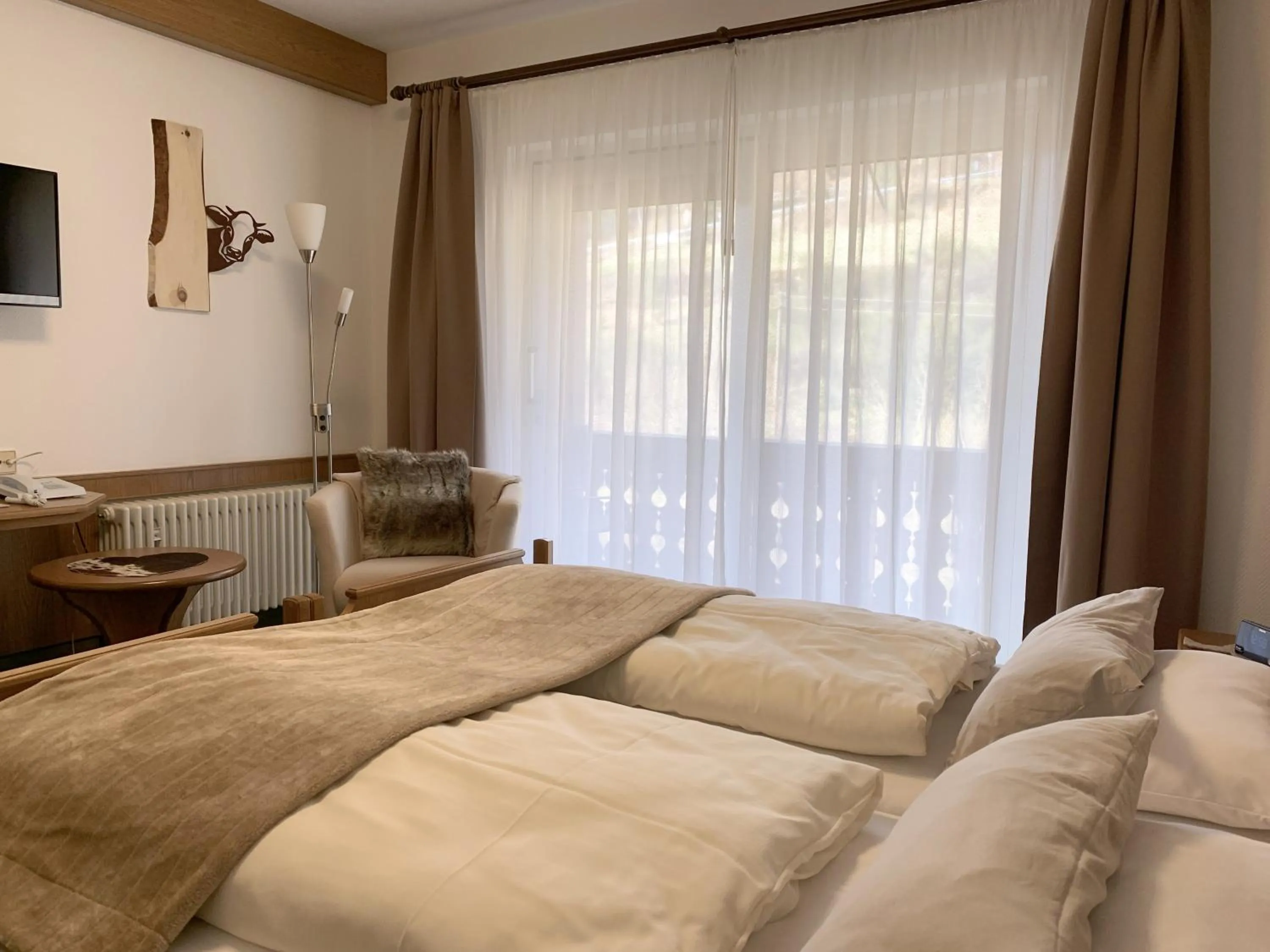 Photo of the whole room, Bed in Landhotel Untere Kapfenhardter Mühle