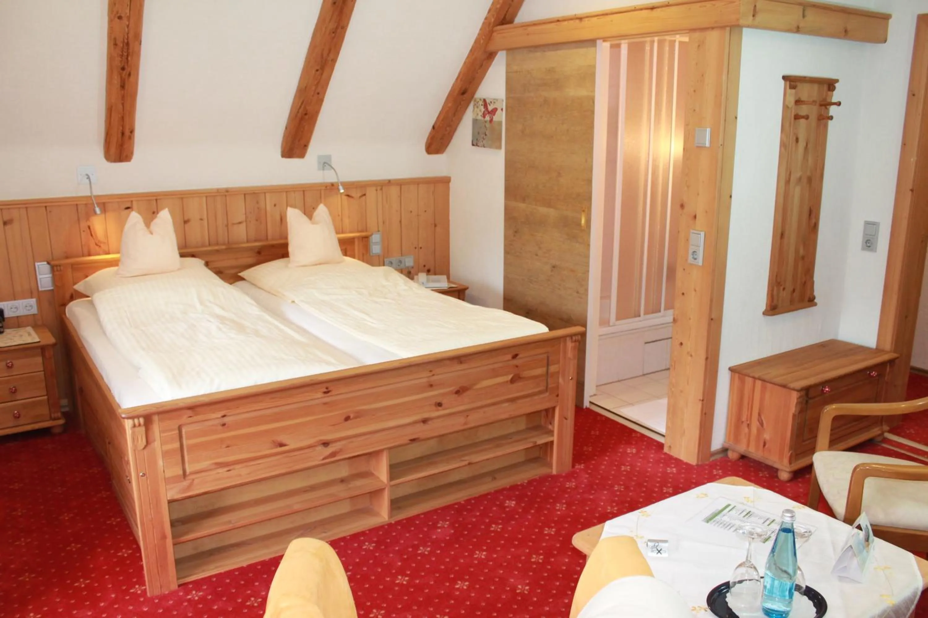 Photo of the whole room, Bed in Landhotel Untere Kapfenhardter Mühle