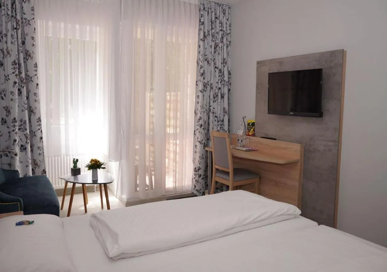 Bed in Hotel-Pension Am Böhmepark