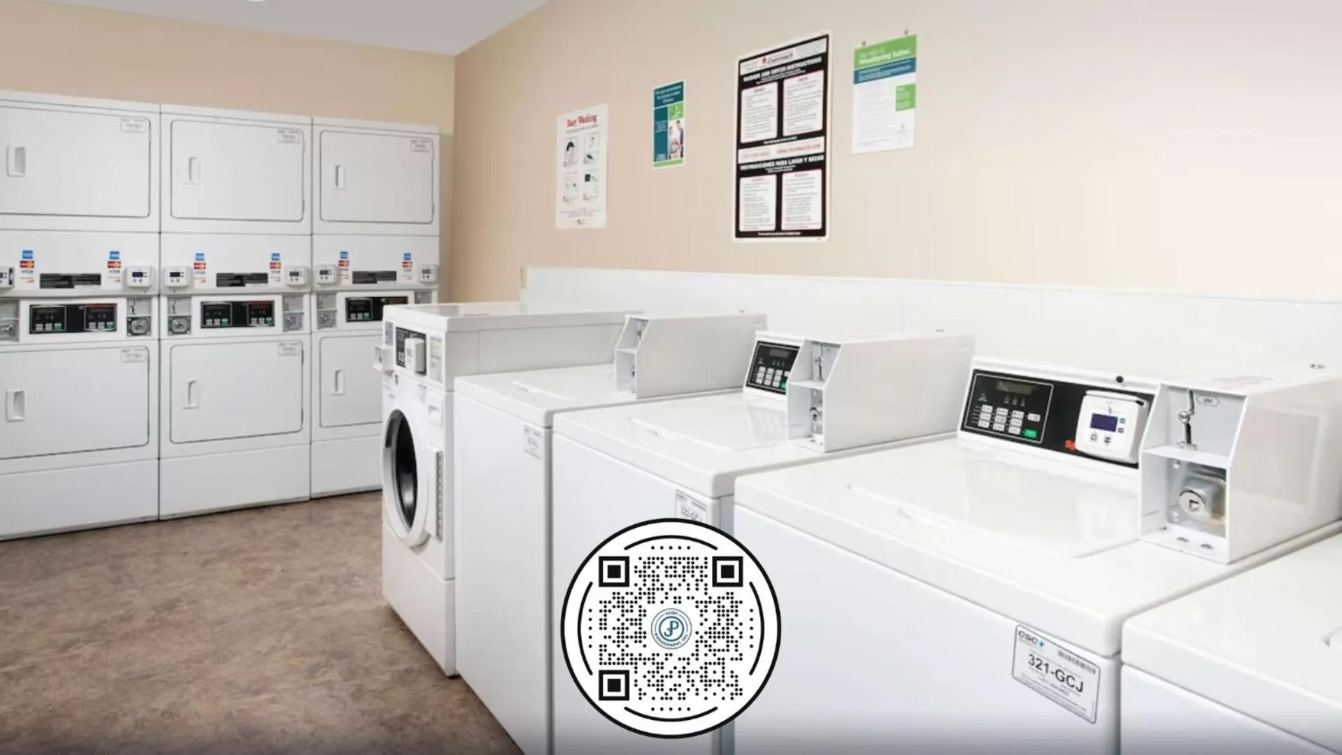 washing machine, Bed in WoodSpring Suites St Louis Arnold