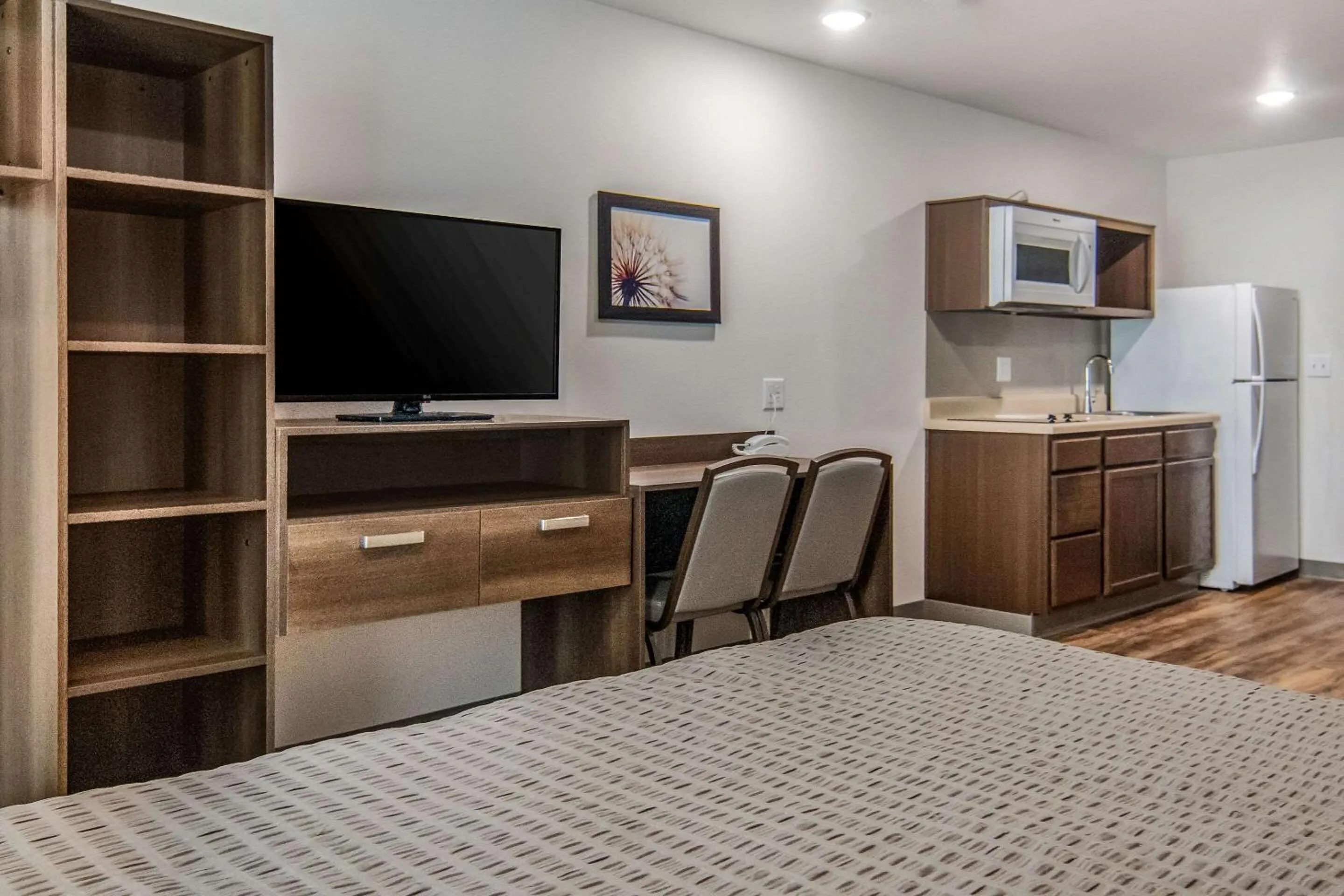 Photo of the whole room in WoodSpring Suites North Ft Worth Alliance TX Speedway