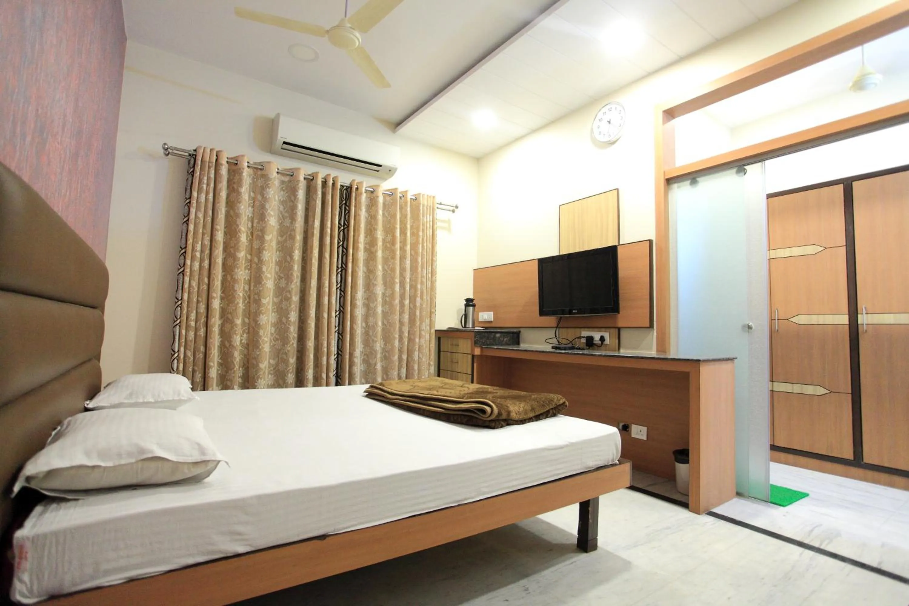 Bed in Hotel Anuvibha Malviya Nagar