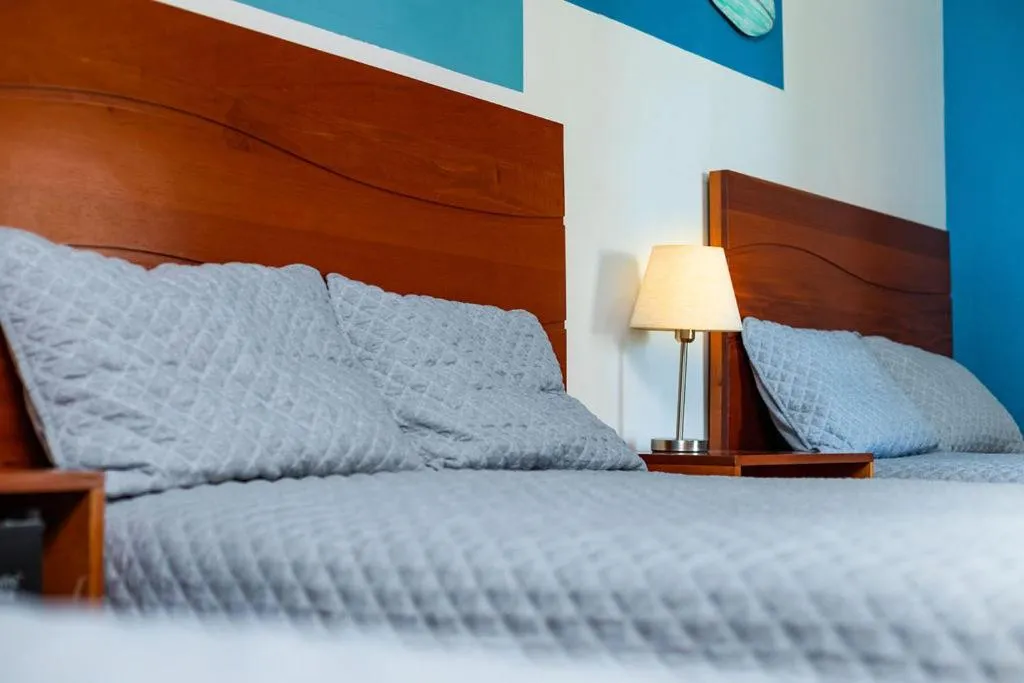 Photo of the whole room, Bed in Hotel Palmazul - Viña del Mar