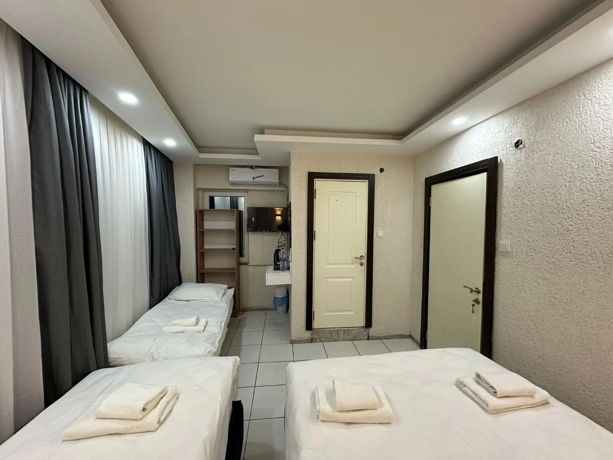 Bed in Mitra Downtown Hotel