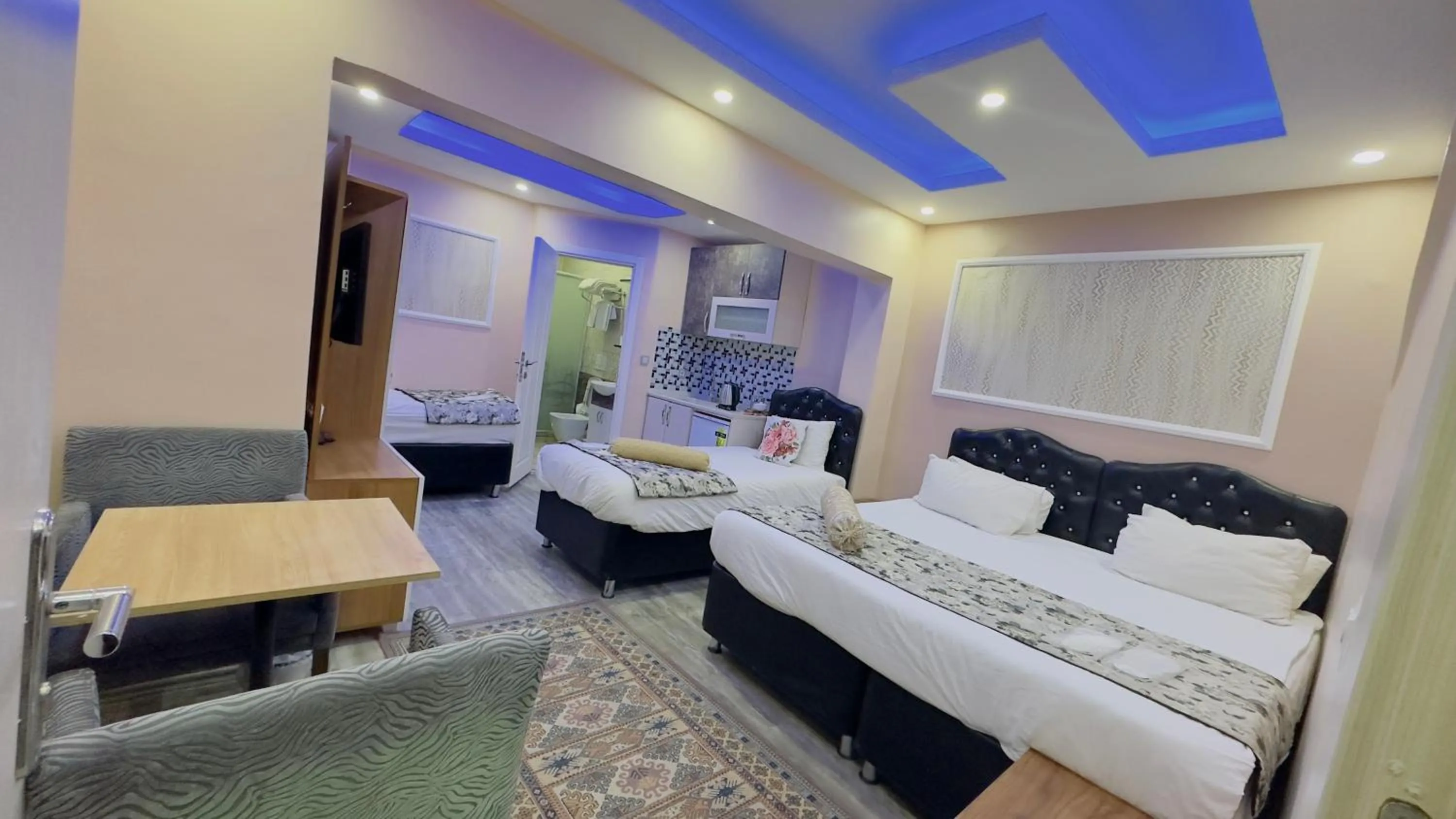 Bed in Mitra Downtown Hotel