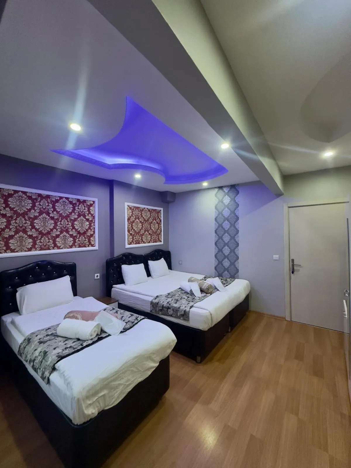 Photo of the whole room, Bed in Mitra Downtown Hotel