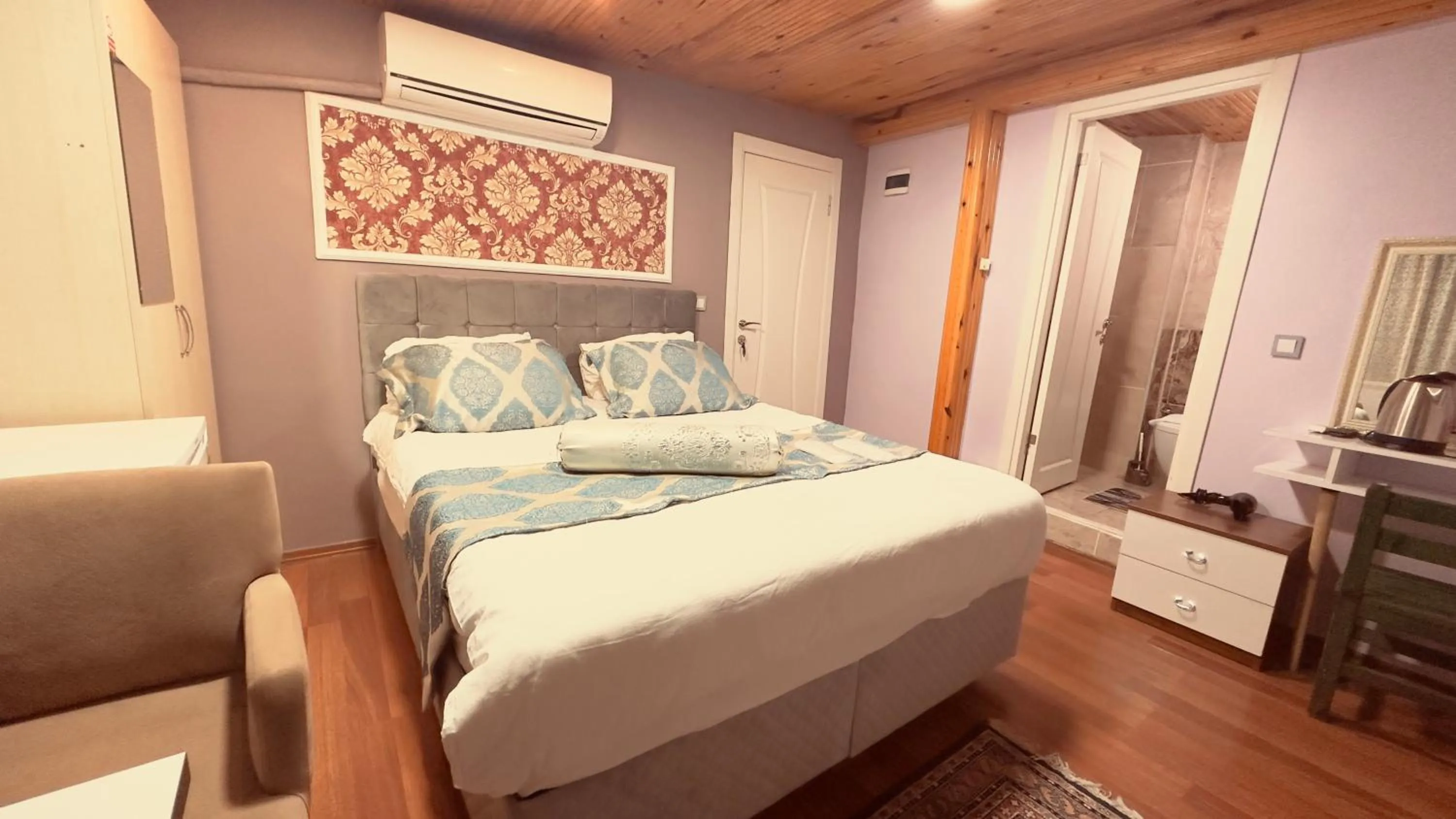 Bedroom, Bed in Mitra Downtown Hotel