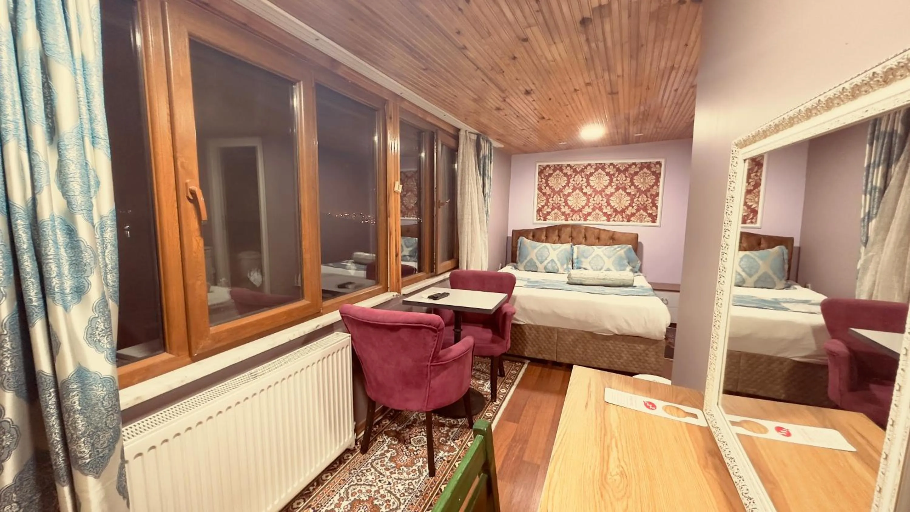 Photo of the whole room, Bed in Mitra Downtown Hotel