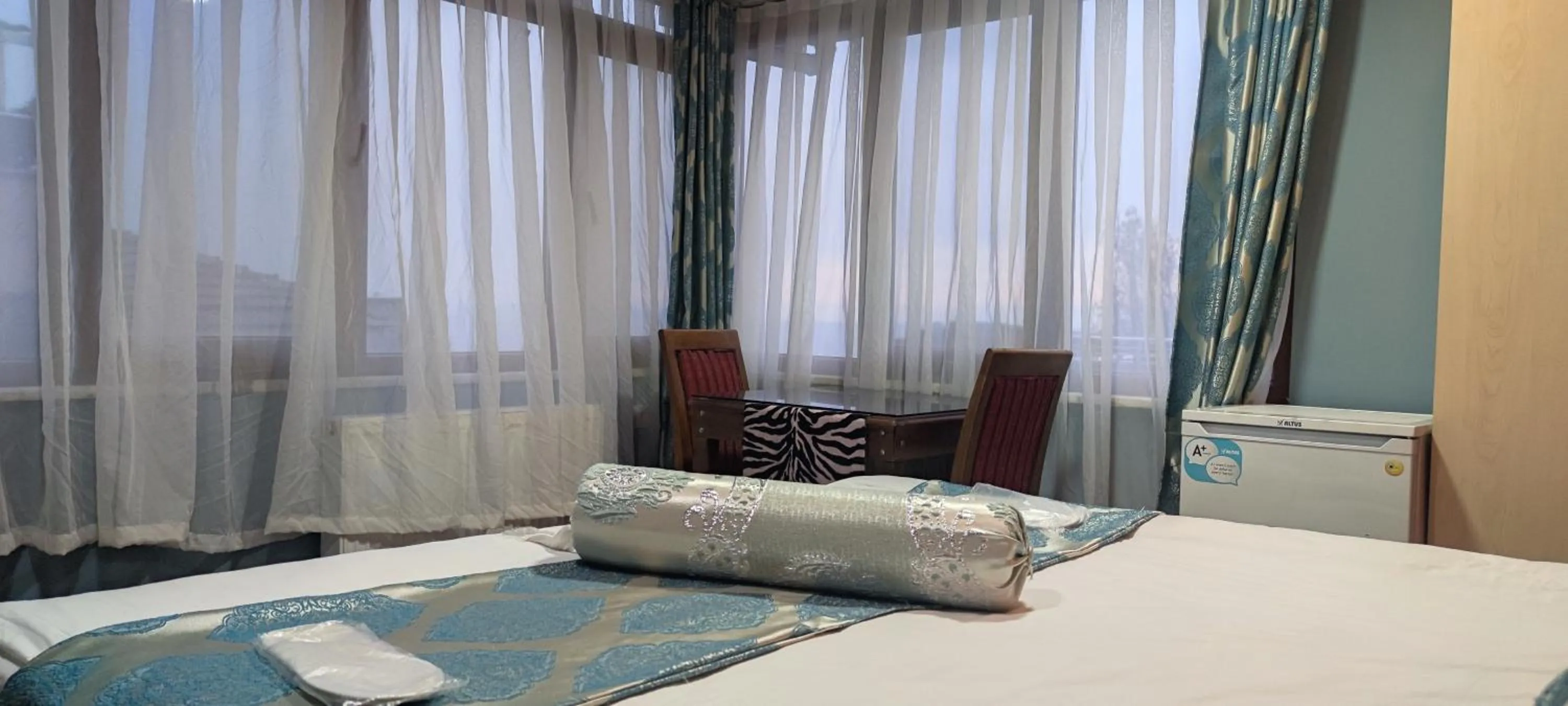 Bed in Mitra Downtown Hotel