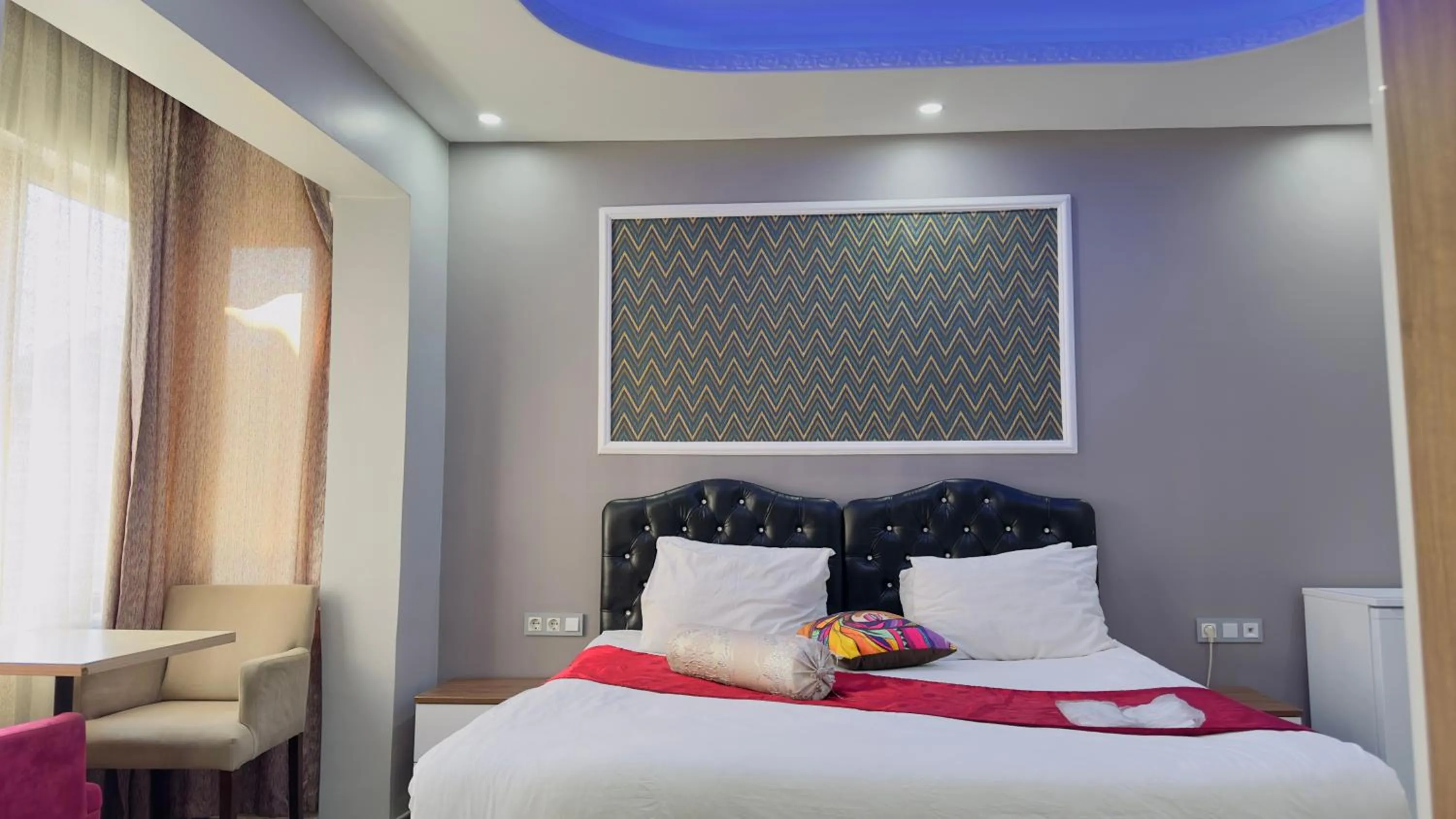 Photo of the whole room, Bed in Mitra Downtown Hotel