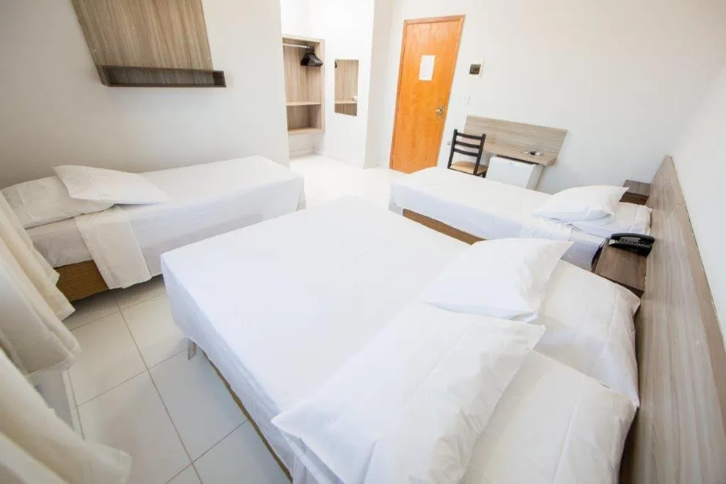 Bed in PUMMA BUDGET HOTEL