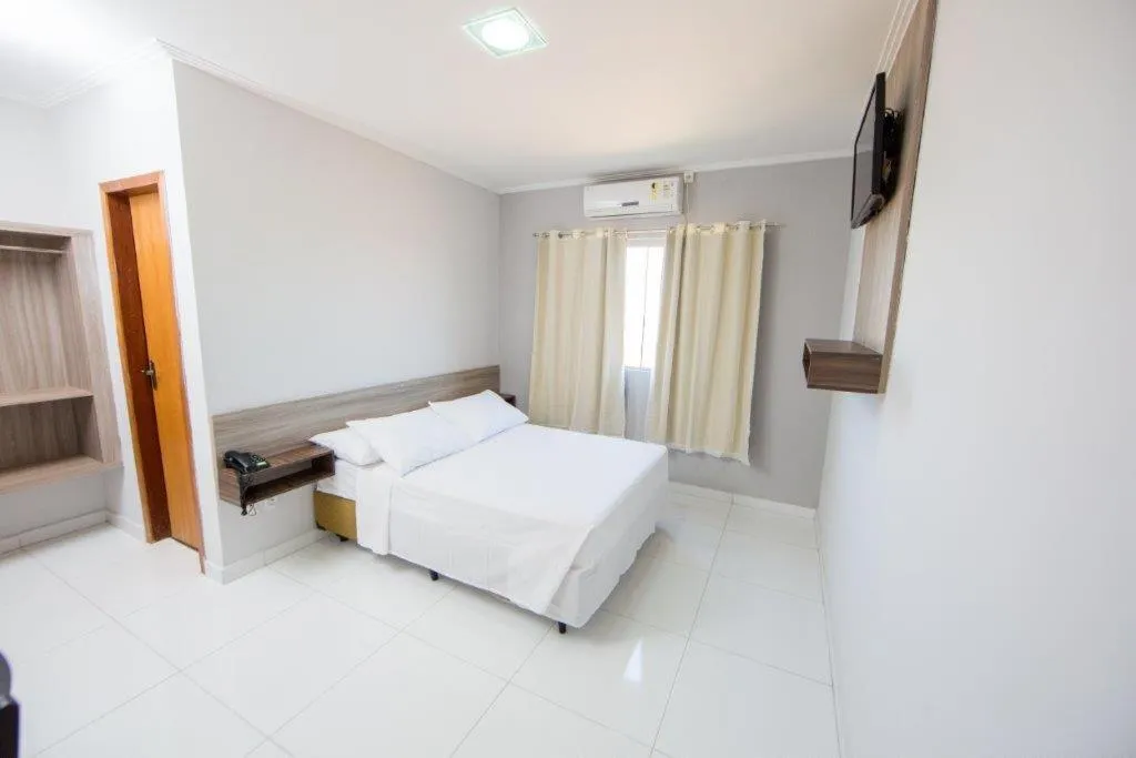 Bed in PUMMA BUDGET HOTEL