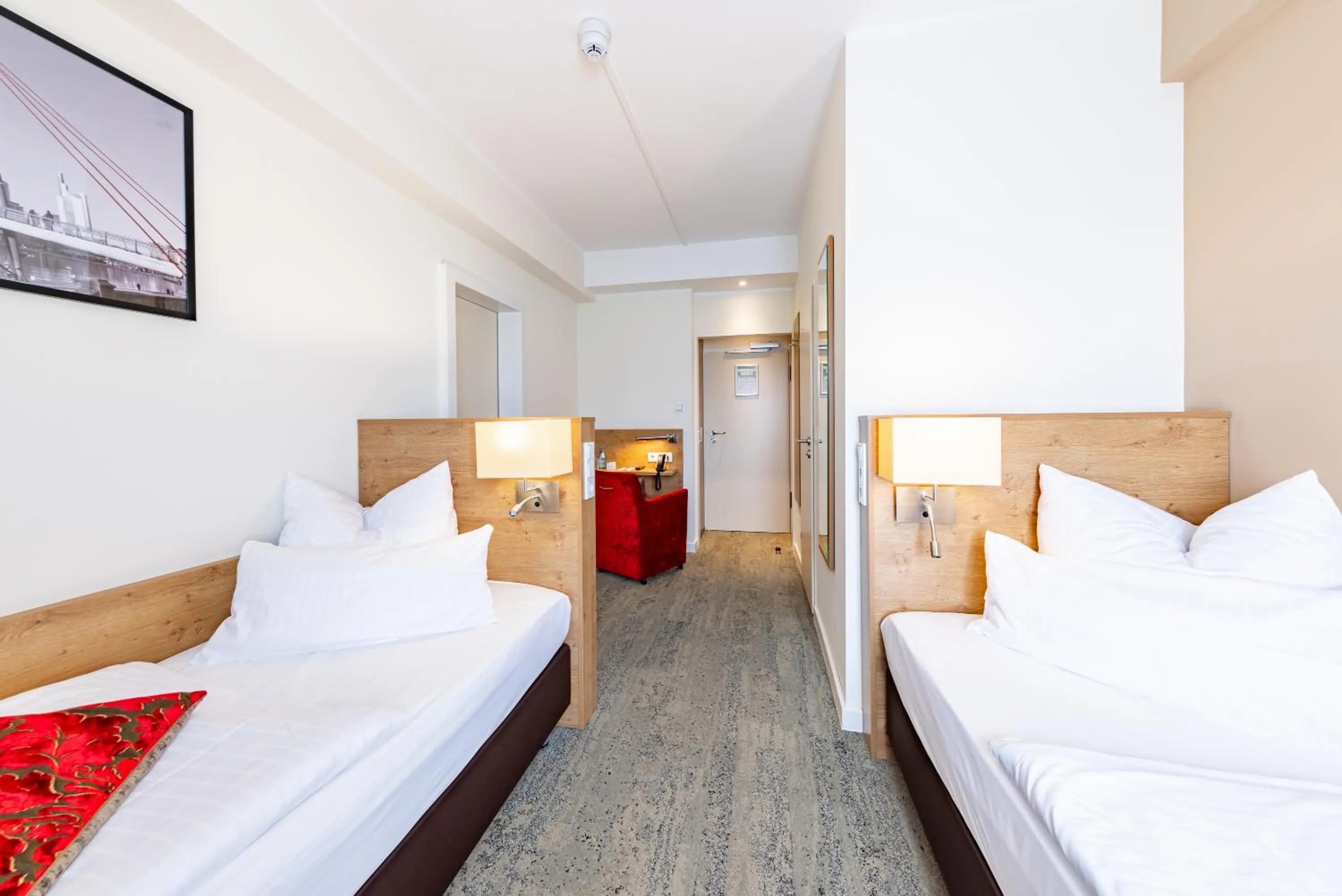 Bed in Maingau Hotel