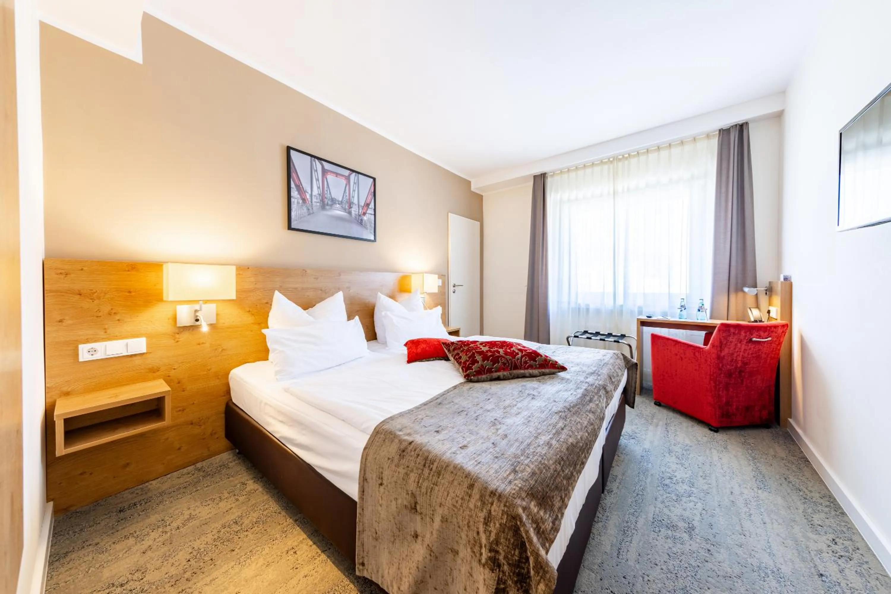 Photo of the whole room, Bed in Maingau Hotel