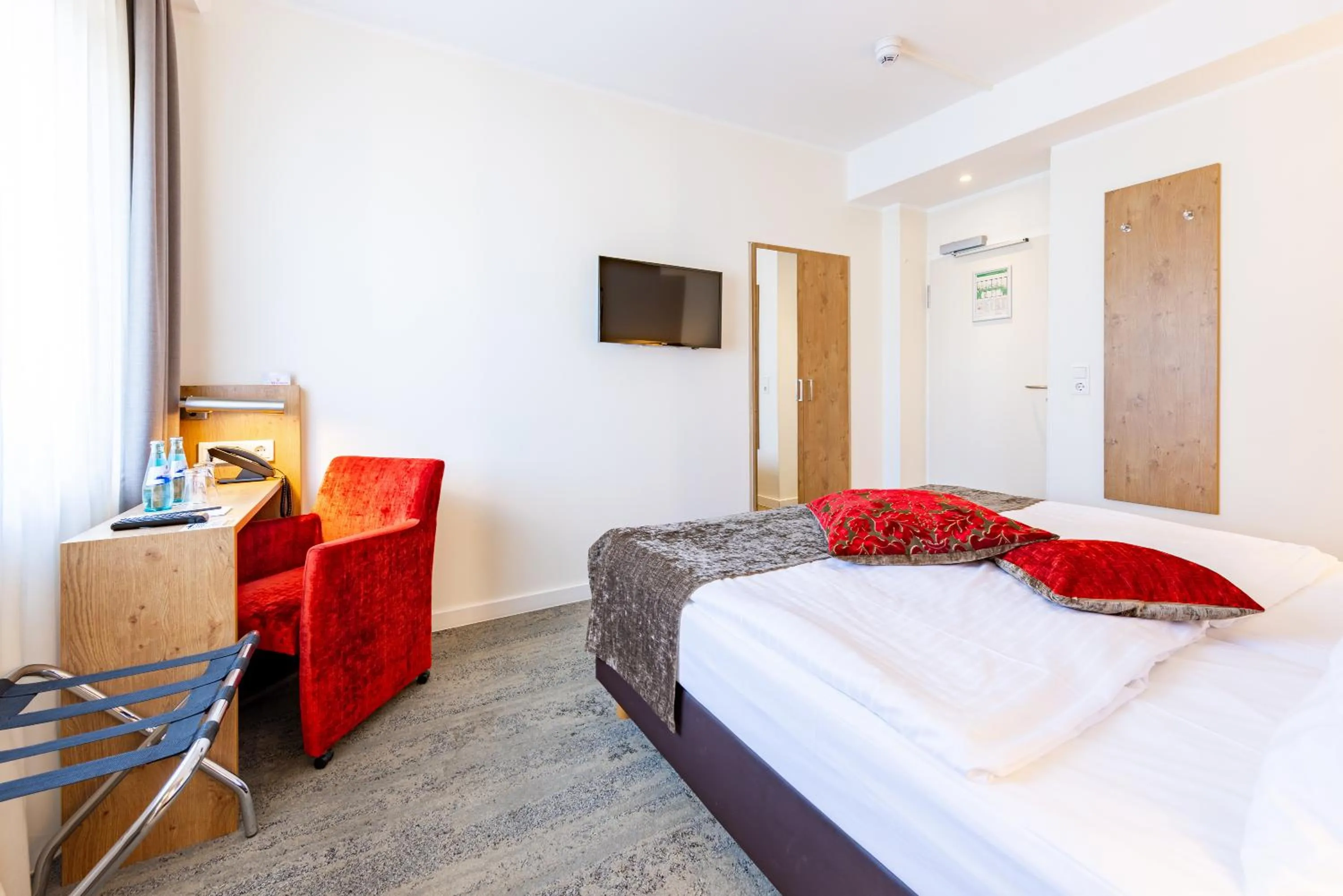 Bed in Maingau Hotel